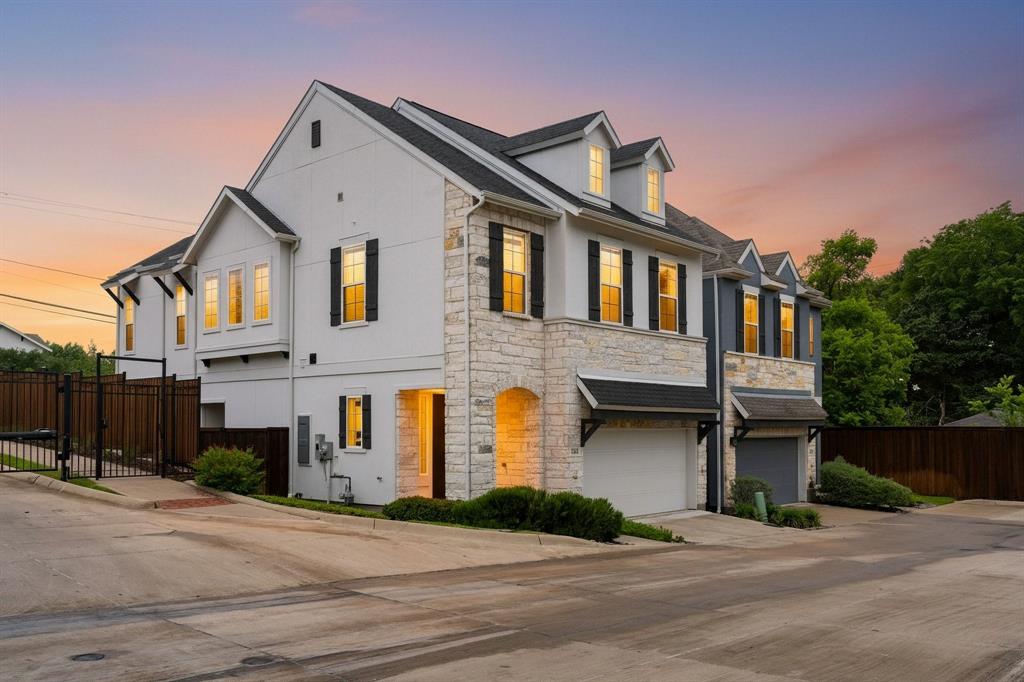 Prime opportunity to own one of the premier corner lots in this beautifully landscaped, tree-lined David Weekley Homes community. This quaint gated community adjacent to Forest Hills features 35 energy efficient homes with a shared fire pit and walkways. Abundant natural light welcomes you into an open-concept floor plan featuring generous counter space and low-maintenance quartz surfaces—ideal for both everyday living and entertaining. Durable luxury vinyl plank flooring flows throughout the main living areas, complemented by plush carpeting in the bedrooms.All bedrooms are thoughtfully situated upstairs, and this residence stands out as one of the few four-bedroom floor plans available in the neighborhood. Enjoy outdoor living in your spacious, lush backyard, ideal for grilling and entertaining guests. Conveniently located just minutes from Interstate 30, White Rock Lake, and the Dallas Arboretum and Botanical Garden. Discover easy access to the Trinity Forest Spine Trail just across the street, offering a direct connection to White Rock Lake along with nearby outdoor recreation, dining, and entertainment options.