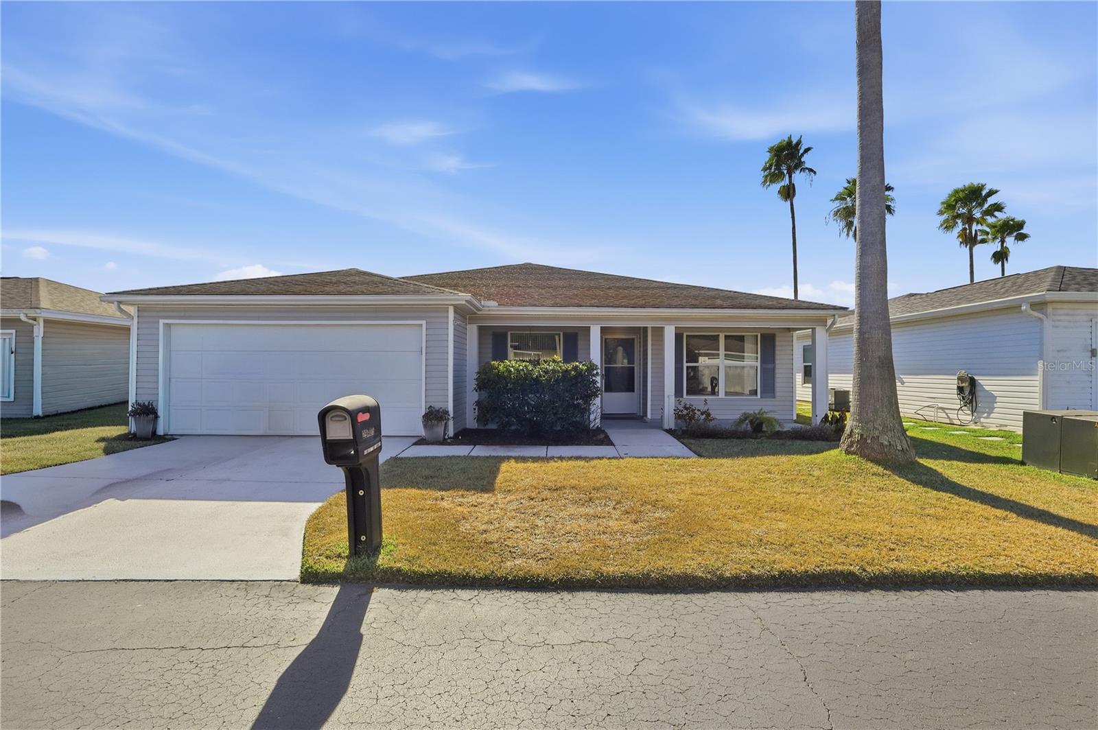 Welcome to Tampa Bay Golf & Country Club, the premier 55+ community offering an exceptional lifestyle in a guard-gated setting with private streets and NO CDD fees! This charming, move-in-ready home features two true bedrooms plus a versatile office that could easily function as a third bedroom. The bedrooms are generously sized, and the spacious primary suite includes a large walk-in closet, an additional linen closet, and a beautifully appointed bathroom with dual sinks and a walk-in shower. The second bedroom is also spacious and has its own designated guest bathroom. The open family room is warm and inviting, featuring cozy carpet over beautiful wood-plank tile floors that extend throughout the main living areas. The kitchen has been updated with NEW appliances and offers ample space for a coffee bar or casual dining. The home also includes a separate formal dining room. One of the standout features of this home is the bright and spacious Florida room, which leads directly to a screened-in porch, perfect for relaxing and enjoying Florida living year-round.Residents of Tampa Bay Golf & Country Club enjoy access to an outstanding, resident-owned clubhouse with an onsite restaurant and pub/grille, banquet facilities with a stage and dance floor, and three clubhouses offering endless social opportunities. Amenities include an 18-hole championship golf course, a 9-hole executive course, tennis and pickleball courts, shuffleboard, bocce, horseshoes, two swimming pools (one heated), a hot tub, a state-of-the-art fitness center, two dog parks, a fire pit, and much more. A full calendar of clubs, organized activities, onsite entertainment, and travel excursions adds to the vibrant lifestyle. Conveniently located just off I-75, close to Publix shopping and the charming downtown Dade City, and also near Wesley Chapel, where you’ll find top-rated dining, shopping, and entertainment. Additional nearby attractions include Wiregrass Mall, AdventHealth Center Ice Skating and Hockey Rinks, Tampa Premium Outlets, The Krates, BayCare and AdventHealth hospitals, Moffitt Cancer Center, PopStroke Mini Golf, and more. Don’t miss thisgreat property!