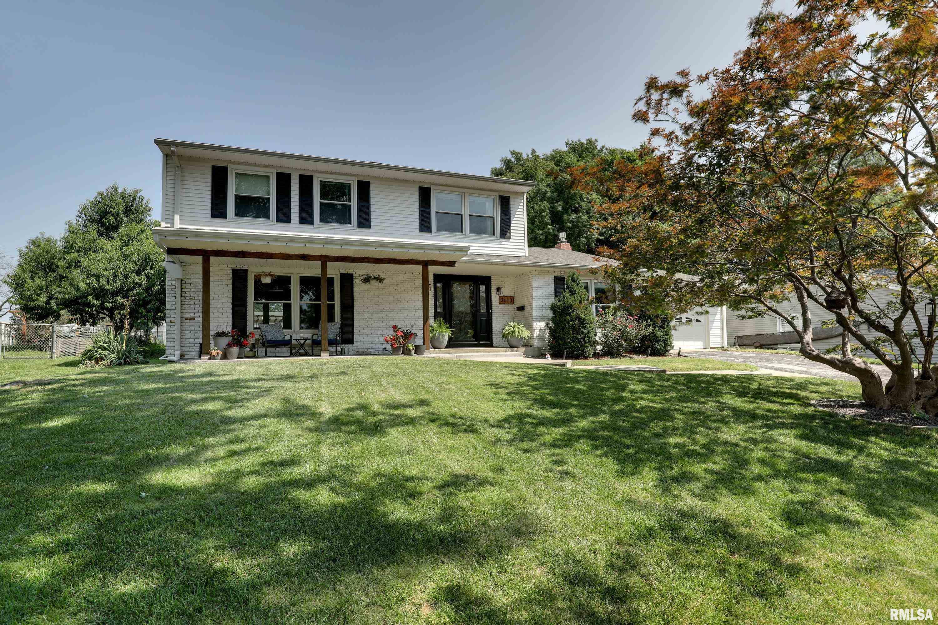More space, more updates, and a location you’ll love! This beautifully maintained 4 bedroom, 2.5 bath home with a dedicated office offers over 2,100 square feet of finished living space, plus 900+ square feet of unfinished basement ready for storage, a workshop, home gym, or future expansion. Designed for both everyday living and entertaining, the main level features two spacious living areas, a formal dining room, and an updated eat-in kitchen where everyone naturally gathers. Double pane vinyl replacement windows provide comfort and energy efficiency throughout the home. Upstairs, you’ll find four generously sized bedrooms with exceptional closet space. The primary suite offers a private full bath with a walk-in shower, while the additional bedrooms are large enough to grow with your needs.  Step outside to enjoy your morning coffee on the welcoming covered front porch or host summer cookouts on the expansive back patio overlooking the fully fenced backyard. An attached 2-car garage adds even more convenience. You’ll appreciate the long list of updates, including a full roof tear-off (2009), new flooring throughout (2020), a covered front porch addition (2022), and new interior doors and trim throughout.  Located in desirable South Central Quincy, you’re just minutes from shopping, restaurants, parks, and everyday conveniences. This move in ready home offers the space, updates, and location you’ve been looking for!