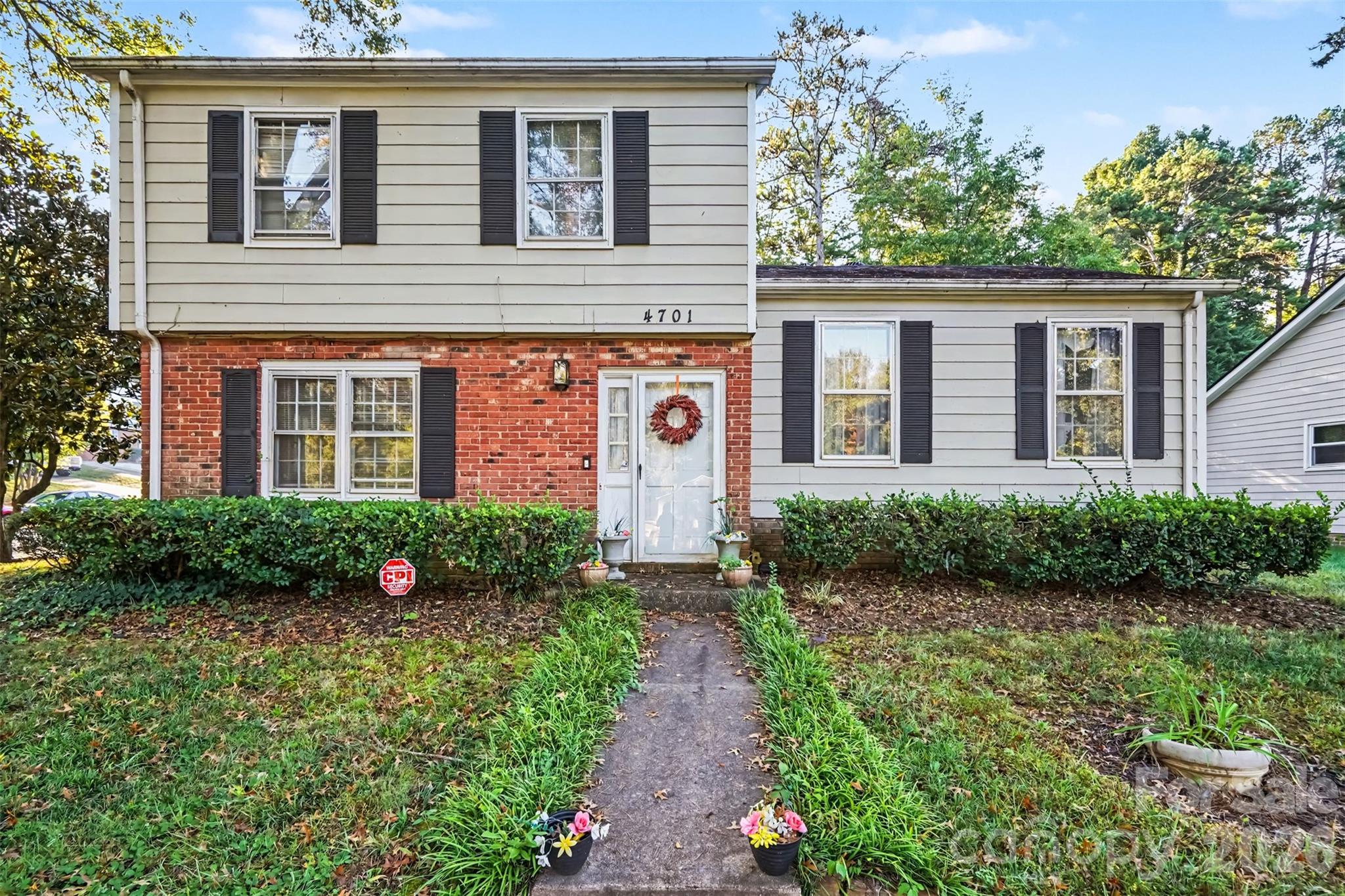 Welcome to 4701 Farm Pond Lane, a beautifully maintained home in the heart of East Charlotte! Lovingly cared for and full of charm, this corner lot home offers a wonderful opportunity to move right in and enjoy its timeless appeal or add your own personal touches over time. The pride of ownership is evident throughout!  The bathroom on the lower level has been updated with a gorgeous tiled walk-in shower.Beyond the home, you'll love the community amenities! Spend summer days relaxing by the expansive swimming pool, featuring a 9-foot deep end, gather with friends and neighbors at the recently remodeled clubhouse, or enjoy the community playground.Conveniently located in East Charlotte, you'll enjoy easy access to shopping, dining, entertainment, and major roadways, keeping everything Charlotte has to offer within reach.Well maintained, ideally located, and packed with community perks, this is a home you won't want to miss!