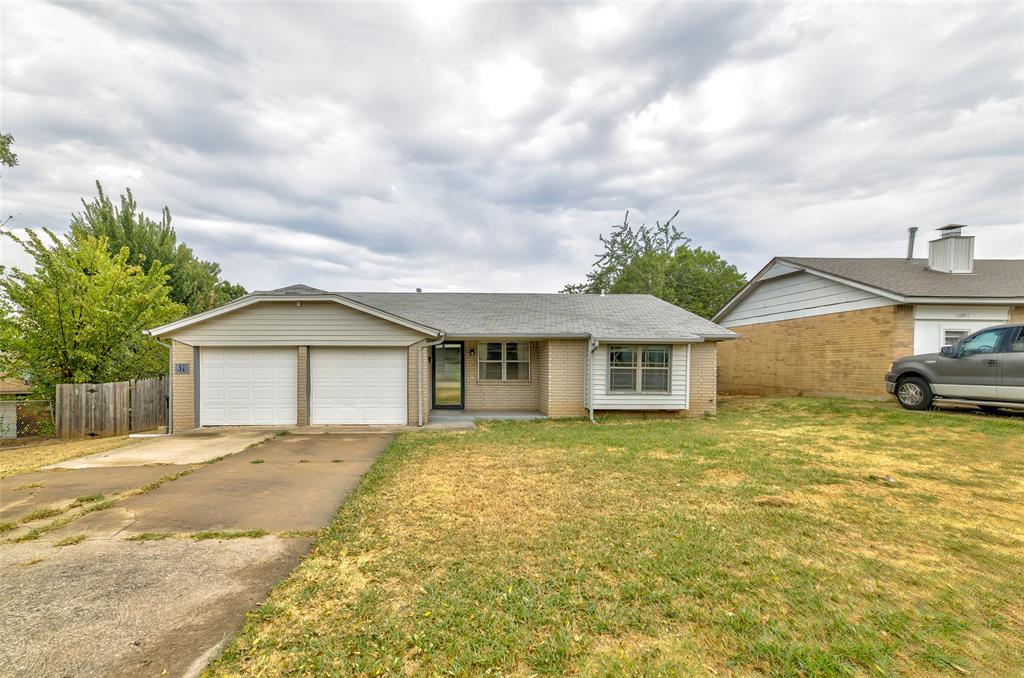 This charming 3-bedroom, 1.5-bath home is ready for its next chapter. Walk inside to an inviting living room that opens seamlessly into the kitchen and a spacious dining area. The kitchen features  wood cabinetry, plentiful counter space, and a window above the sink that frames views of the backyard.All three bedrooms are thoughtfully placed on the opposite side of the home. The primary bedroom stands out with a large window that floods the space with natural light and includes a half bath.Outside, mature trees along the east side of the lot create a sense of privacy and added space from neighboring homes. Enjoy a nice-sized yard, covered front porch, and a two-car garage.