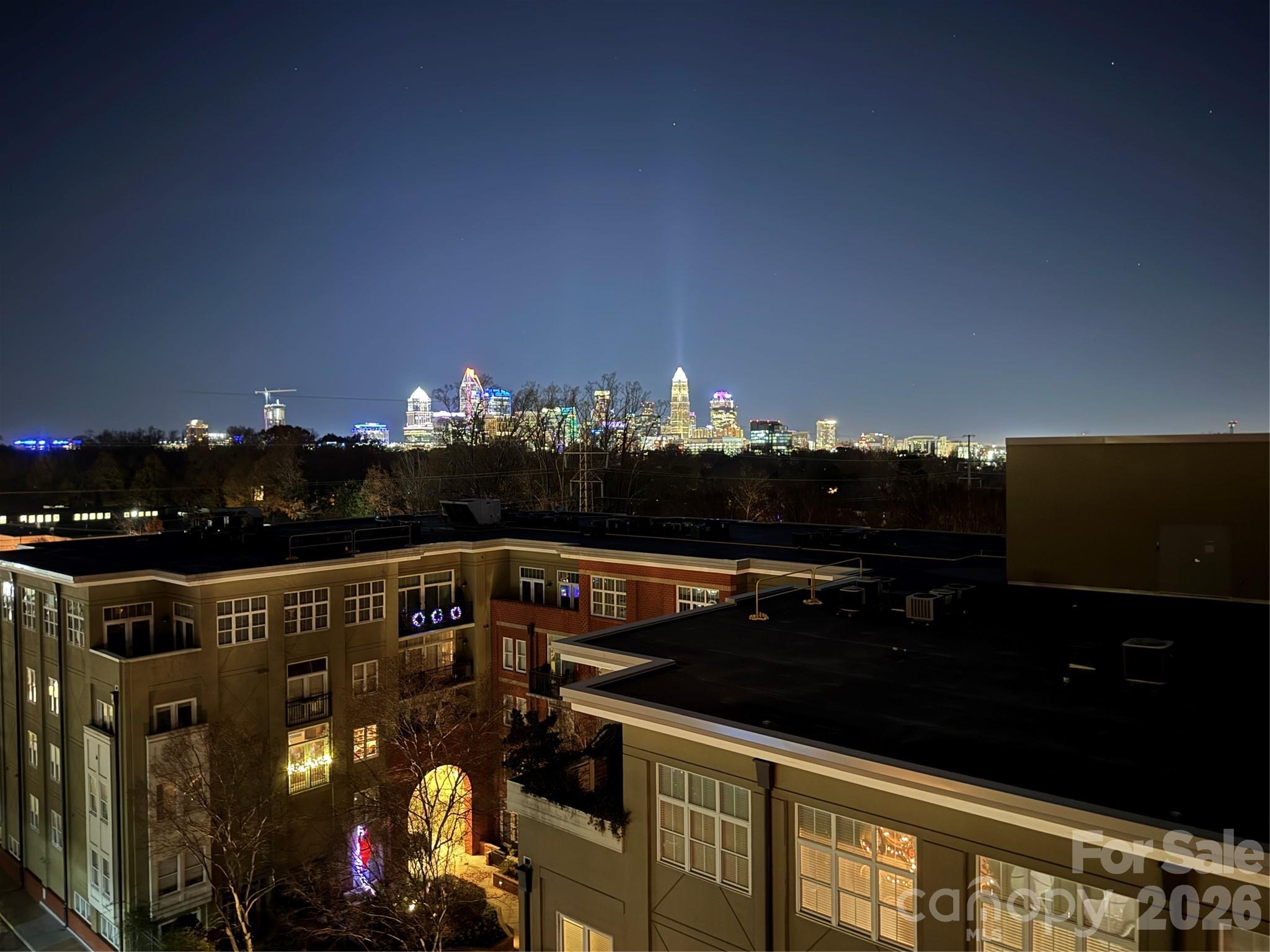 Elevated Dilworth living with Uptown views and an unbeatable location. This beautifully updated penthouse delivers the best of Charlotte’s urban lifestyle, just minutes from Uptown and within easy walking distance of restaurants, shops, groceries, Freedom Park, and Atrium Hospital. Two covered private patios—one off the living room and another off the primary bedroom—provide exceptional outdoor living and spectacular Uptown skyline views.Located in a secure concrete-and-steel building with a well-managed HOA, residents enjoy an impressive collection of amenities including a fitness center, rooftop terrace with panoramic city views, secure building entry, 4+ covered parking spaces, and a deeded storage locker.With its combination of stylish updates, private outdoor spaces, skyline views, secure parking, and an enviable Dilworth location, this is urban living designed for those who want convenience without compromising comfort or quality. Walkable. Connected. Elevated. And just 3 minutes from Uptown.