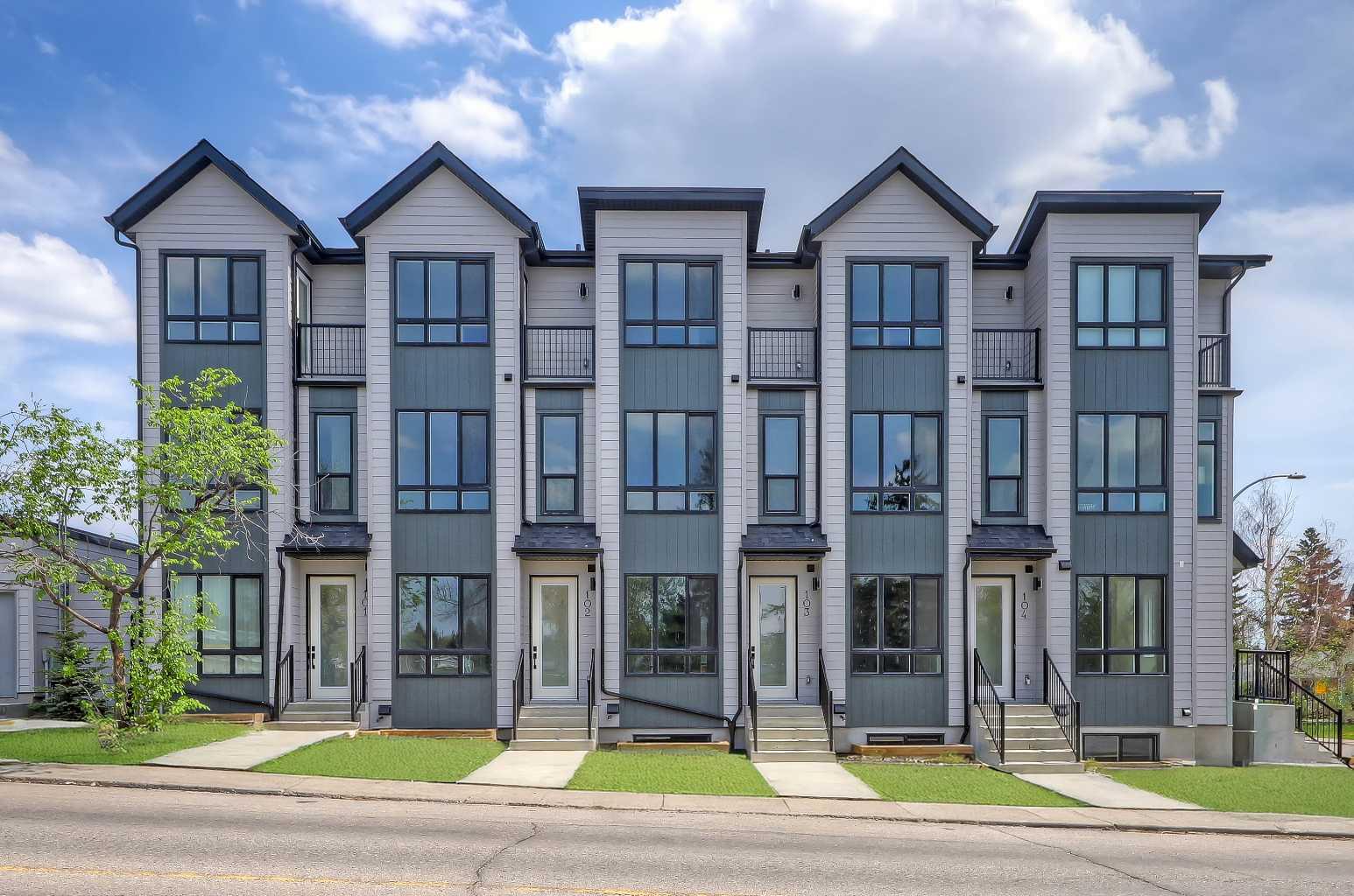 BRAND NEW, MOVE-IN READY TOWNHOMES in Glenbrook! This townhome project is AIRBNB FRIENDLY, plus first-time home buyers could qualify for a GST REBATE* on their purchase! This listing includes TWO titled units: one upper-level 2-storey unit (#108) featuring nearly 1,100 sq ft, with 2 beds, 2.5 baths, and a single detached garage, PLUS one lower-level unit directly below (#103) boasting a sunny main floor plus a FULLY FINISHED BASEMENT totalling over 1,00 sq ft of developed living space, with 2 beds & 2.5 baths. Live in one and rent the other, or combine both for personal use and have a 4-bedroom townhome with over 2,100 sq ft of living space! Both units feature a sunny and bright open-concept living space, with sleek, low-maintenance luxury vinyl plank (LVP) flooring and large windows. The fully equipped modern kitchens boast dual-tone slab-style cabinetry, quartz countertops, and Samsung stainless steel appliances, including a French-door refrigerator and ceramic-top stove. Completing the main floor of both units is a spacious dining area perfect for family meals and entertaining, a living room with large windows for ample natural light and a stylish 2-piece powder room. The upper-unit level (#108) features a lacquered spindled railing leading to the sunny upper floor, where 2 bedrooms and 2 full bathrooms await. Each bathroom features custom cabinetry, quartz countertops, undermount sinks, and fully tiled showers. The lower-level unit (#103) has a fully developed basement featuring 2 bedrooms and 2 full bathrooms. Each bathroom boasts custom cabinetry, quartz counters, undermount sinks, and tiled tub/showers. Plus, both units feature a convenient in-suite laundry closet with a stacked washer/dryer. Durable and stylish, the exterior features Hardie Board and Smart Board detailing, and brushed concrete steps and walks. Located in the heart of the sought-after SW inner-city community of Glenbrook, these brand-new townhomes boast a fantastic location right across the street from Glenbrook School and the Glenbrook Community Association. A number of major amenities are located within an easy 15-min walk, including Safeway, Glamorgan Bakery, and multiple restaurants including Richmond’s Pub. Plus, nearly every imaginable amenity can be found in nearby Westhills and Signal Hill Centres which are just a 6 minute drive away. Sarcee Trail and Richmond Rd are both readily accessible.  *Buyers must qualify for the GST rebate program, enquire for details. *VISIT MULTIMEDIA LINK FOR FULL DETAILS INCLUDING FLOORPLANS AND A VIRTUAL TOUR!*
