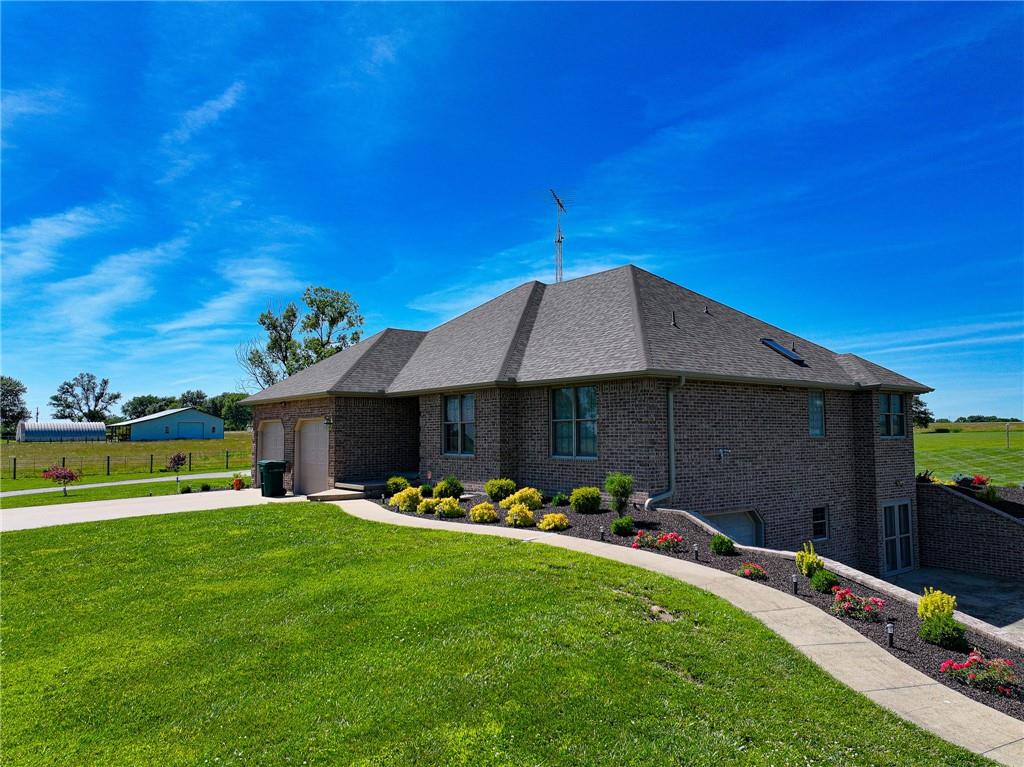 Home for Sale St. Clair County Step inside this stunning 5 bedroom (two non-conforming), 3 bathroom, 3,000sqft home nestled on 5 +\- acres in Lowry City MO! Built in 1999, this beautiful brick home has a 2 car garage with a walk-out basement that has additional garage space. The home has a beautiful walk-in shower with double sink vanities and an additional vanity and several other modern upgrades in the main bathroom. The finished basement also has 2 non-conforming bedrooms and a full bathroom as well. The home has been kept beautifully with custom cabinets, hardwood floors, tiled floors, new landscape, and ready for it's new owner! This 5 +\- acre property has a pond, 40x50 multiple room shop that is well insulated with heat and air, LED lights, and plenty of room for boats, campers, or farm equipment. This home is equipped with fiber internet as well. Taxes on the home were roughly $1,450.00 in 2023 and in the Lakeland School District. House For Sale Truman Lake Lowry City MO is just 10 minuted from Clinton which has your basic shopping needs, along with the Golden Valley Memorial Hospital. It's just slightly over an hour for both Kansas City and Springfield for your bigger city needs. This home sits within 10 minutes of several truman lake boat ramps, allowing all lake activities.
