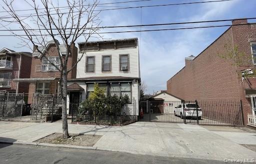 READ COMPLETELY - 37-30 and 37-28 58th Street. Two lots each 25 X 100. Separate tax bills.Originally a Legal Duplex. Currently set up as a one family, 4 bedroom, 2 bath Colonial with full unfinished basement on a 25 X 100 Plot. PLUS there is another 25 X 100 Plot with a huge Garage and plenty of parking. Features include custom archways, wood moldings, high ceilings throughout, hardwood floors, natural gas cooking and water heater. Perfect for prime residence or investment opportunity. Convenient to shopping, schools, and restaurants. 3 blocks from 61St Woodside Subway station #7 subway line and Woodside Station for LIRR. Convenient distance to Roosevelt Avenue, Northern Boulevard and Queens Boulevard. Convenient to buses. Easy access to major highways: Brooklyn Queens Expressway and Grand Central Pkwy, and only 20 minutes to Manhattan!