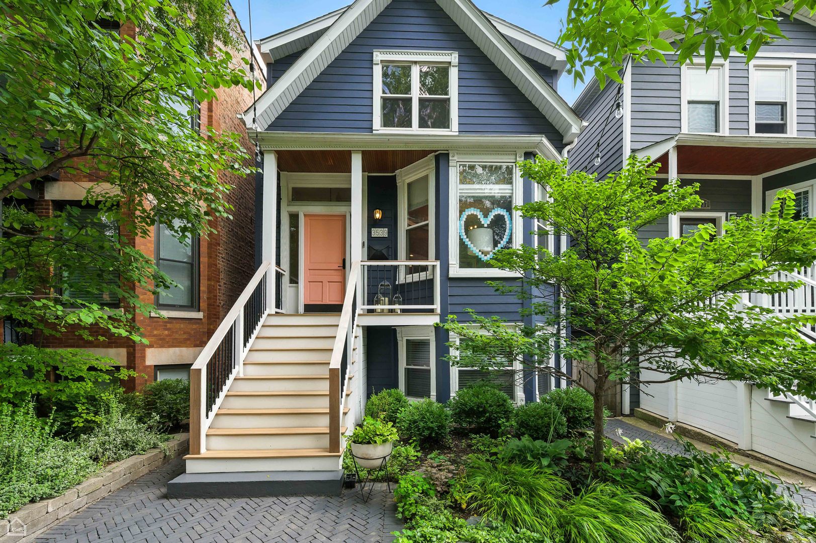 Completely renovated 5 bedroom home in the heart of Roscoe Village-just steps from one of Chicago's top-rated grammar schools! Reimagined in 2018 by its designer-owner, this residence blends beautiful finishes with a cohesive layout and thoughtful use of space.    Major updates include a substantial second-floor expansion, a comprehensive renovation of all bathrooms, a stunning custom kitchen, dual HVAC systems (one added in 2018 and the first-floor unit replaced in 2024), new Hardie board siding, and a new roof on both the home and garage. Designer details can be found throughout, including two primary walk-in closets, high-end finishes, and a professionally landscaped yard worthy of a magazine feature.    The lower level is above grade, offering abundant natural light and direct walkout access to the yard. The main floor is filled with sunlight from oversized picture windows and features a magazine-worthy kitchen, a dedicated family room and living area, plus a full bedroom that can also serve as an office, study, or guest room.    Upstairs, the completely redone top floor offers three spacious bedrooms, four walk-in closets, its own HVAC system, and two beautifully renovated bathrooms. Taxes 14,561