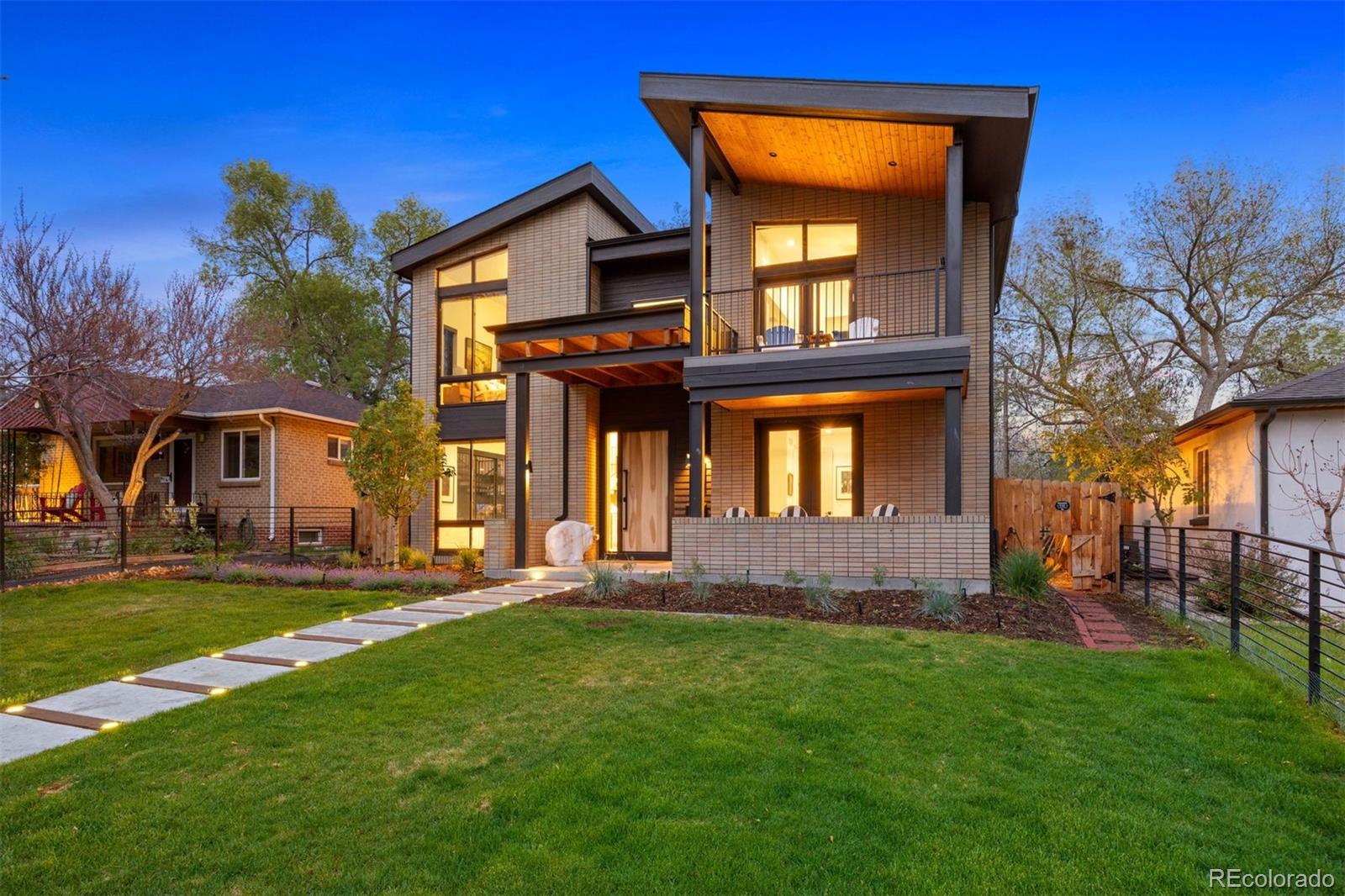 This stunning, contemporary 5-bedroom Cory Merrill home is an urban oasis that you will never want to leave.  This 2024-build residence has been designed and executed with special attention to maximizing space, light, and functionality.  No detail has been overlooked, and this original owner has improved on perfection with many tasteful modifications. Upon entering the residence, the soaring ceilings and open floor plan is flooded with light. Hardwood floors throughout. A generous formal dining room leads you to a gourmet granite kitchen with top-of-the-line stainless appliances. Adjacent to the kitchen is the south and east facing family room with fireplace and sliding glass doors that open to the back courtyard and private backyard, bringing outside in. Adjacent to the powder room is the tasteful, private study (5th Bedroom) with glass exterior doors that open to the front patio. Completing this main level is a 3-car tandem garage w/alley access.  A contemporary hardwood staircase leads you upstairs.  The vaulted Primary Suite includes a west-facing balcony, fireplace, baccarat crystal chandelier, a gorgeous 5 pc bath with marble flooring and walls and a steam shower, adjacent to a huge walk-in closet. Completing this upper level are 2 more bedrooms, each with ensuite baths & loads of light, and a spacious laundry with storage cabinets and sink.  A DREAM entertaining and “hanging” basement includes a family room, large entertainment wet bar with seating, guest bedroom, full bath, and “OMG” a golf simulator studio (6th Bedroom). It just doesn’t get much better.