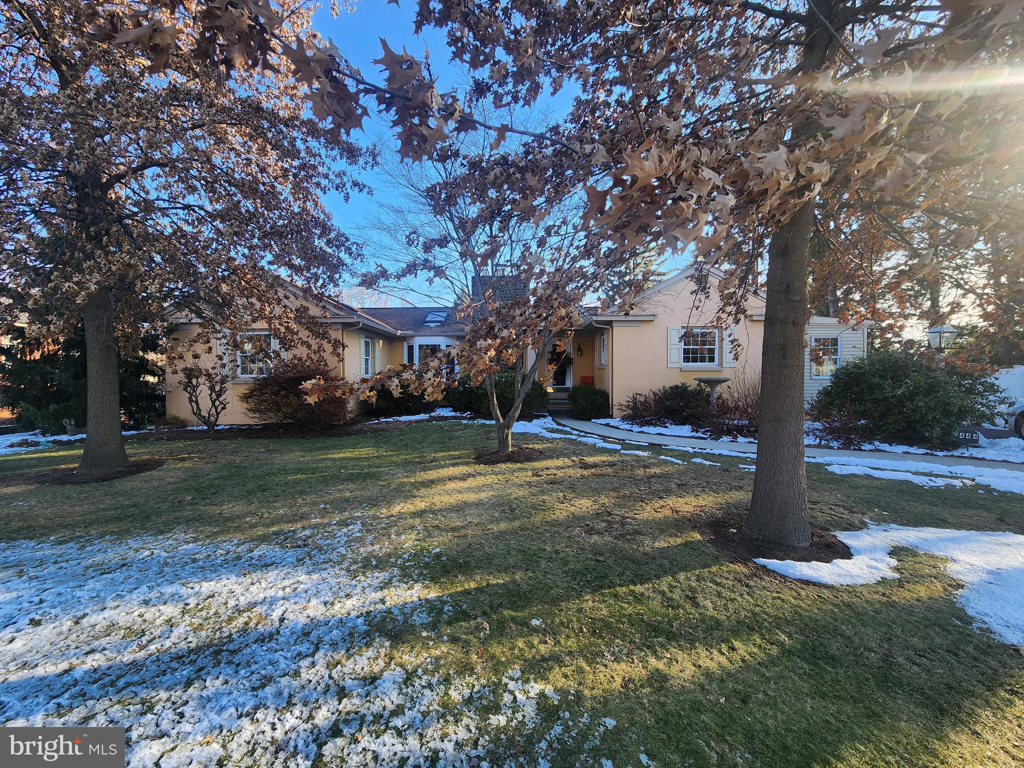 This property will be offered at Public Auction on Saturday, April 11, 2026 @ 12pm.  The listing price is the opening bid only and in no way reflects the final sale price.  10% down due at auction, 2% transfer tax to be paid by the purchaser, real estate taxes prorated. This surprisingly large home is located in a residential neighborhood and was formerly used to host students and for short term rentals. The main floor features a welcoming entryway, a cozy living room with a gas fireplace, a kitchen with ample storage, and a formal dining room with vaulted ceilings and access to the outdoor patio. This level also includes two bedrooms, two full bathrooms, an office, a laundry space and a sunroom. The finished basement offers a bedroom with a private outside entrance, two full bathrooms, and a fourth bedroom that could also be used as a family room with a gas fireplace. Additional amenities include a great private outdoor space with two large sheds, a large, attached garage with space for up to four vehicles and convenient access to downtown Mount Joy, as well as Routes 772 and 283