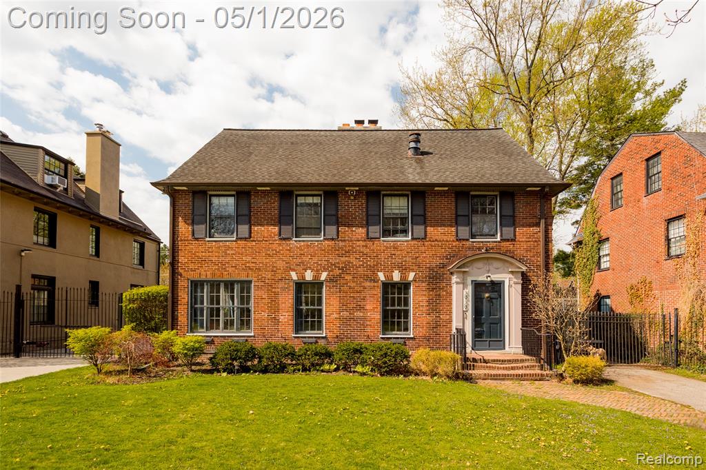 Designed by renowned architects Herman & Simons for the Cook Farm Company in 1921, this elegant 3,100 SF, four-bedroom Colonial Revival in Indian Village blends historical architectural details and timeless craftsmanship with modern updates and impeccable taste. A gracious living room features a rare and striking wood burning inglenook fireplace flanked by a built-in bookcase. Original French doors open to a generously sized dining room adorned with beautifully detailed plaster crown molding. The heart of the home, the spacious kitchen offers the kind of timeless details that never go out of style: honed marble countertops and tile; custom-built cabinetry plus preserved butler’s pantry cabinets; a breakfast nook with built-in banquette seating; and original windows with stained glass detailing. The second level features a gorgeous wood-paneled den with a cozy gas fireplace and library built-ins. The large, serene primary suite includes a private full bathroom and double cedar closets, while two additional bedrooms share a Jack-and-Jill bath—all with preserved original tile. The finished third floor offers a 4th bedroom and full bathroom, plus additional flexible space, which can be used as a family room, exercise space, or office. The home’s solid triple-brick construction has been enhanced with added insulation and storm windows. Recent improvements include refinished hardwood floors throughout; upgraded plumbing and electrical systems; A/C units on the 1st and 2nd floors; a newer steam boiler and water heater; a remote-controlled iron driveway gate; and a landscape sprinkler system in the front yard. A spacious 2 car garage with new doors sits at the rear of a secluded, park-like backyard, which offers lots of room to garden, entertain, and play. Close to Mollicone Park and a short walk to both Nichols and Waldorf Schools, the home is a short stroll to West Village to visit local favorites like Marrow, Two Birds, Norm’s Diner, Sister Pie, Red Hook and Eugenie.