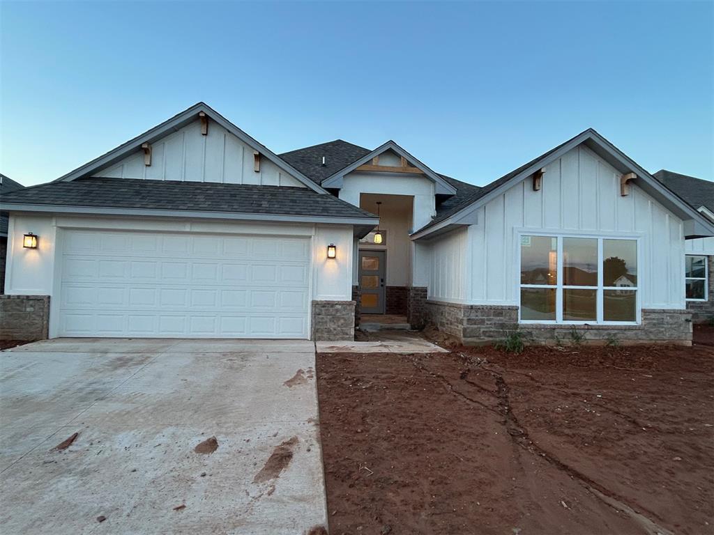 This stunning home will thrill you with it's open layout! You will see the attention to detail everywhere! Spectacular entrance with a wide barrel ceiling leads you into the large living room with beautiful stone and wood fireplace. Wood tile is in all of the main areas. The kitchen is loaded with custom cabinets, thick quartz tops, farm sink, large island, undercabinet lighting, stainless steel Samsung built-in appliances, decorative vent hood and much more! The primary bedroom is very large and leads to a beautiful en suite bathroom with walk in shower, large two sink vanity, soaker tub and enclosed toilet. The spacious primary closet opens to the utility room. Both spare bedrooms are very roomy as well! Big covered back patio. Fence included!! This home backs up to an HOA maintained common area, providing extra space and privacy. Neighborhood amenities incl a pool, large playground and clubhouse with fitness center and gathering hall!