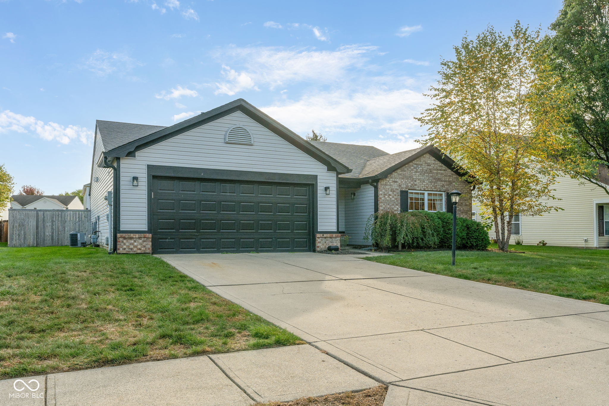Welcome home to this beautifully updated 3-bedroom, 2-bath ranch in the heart of Fishers!  This home perfectly combines comfort, style, and convenience. The open floor plan features vaulted ceilings and abundant natural light, creating a bright and airy atmosphere. The spacious living area flows seamlessly into the stunning kitchen, complete with stainless steel appliances, a large island, and breakfast bar seating-ideal for casual meals or entertaining friends.  The primary suite is thoughtfully separated from the additional bedrooms, offering privacy along with a generous walk-in closet. Two secondary bedrooms provide flexibility for a kids' room, guest space, or home office.  Step outside to enjoy the large concrete patio and privacy-fenced backyard-perfect for relaxing or hosting gatherings. Neighborhood amenities include a pool and tennis courts, and you'll love the convenient location close to top-rated schools, shopping, dining, and walking trails. Newer HVAC, Patio & Fence, Roof, Water Softener and Water Heater!