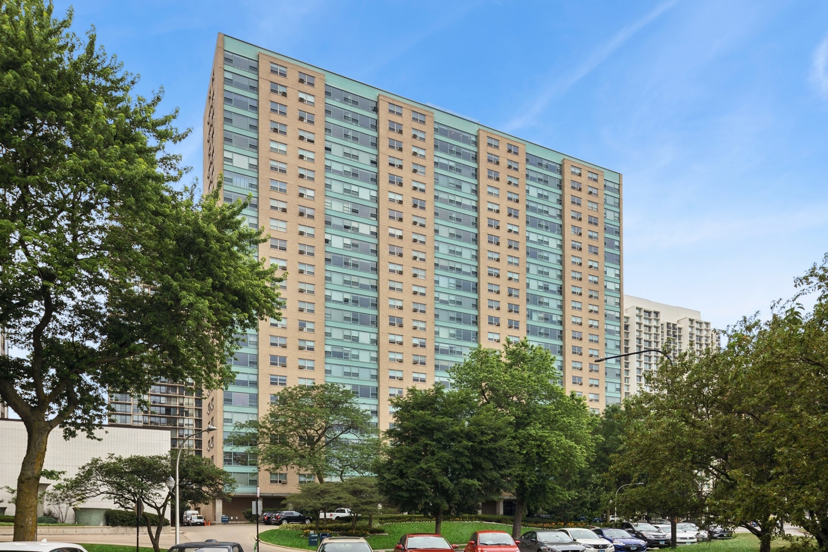 Lake Front living at its best in fabulous East Lakeview!  Step into this exceptionally renovated residence at 3180 N Lake Shore Drive, Unit 3B, where timeless design and modern luxury seamlessly blend. Step through the elegant foyer and enter the thoughtfully reimagined 2 bed/2 bath home that features an open-concept layout, stylish wide plank flooring, and abundant natural light throughout. Enjoy a splendid view of the Lake from the gracious living room and dedicated dining room, with distinctive accent walls adding a touch of flair. The gourmet kitchen is equipped with premium appliances, custom cabinetry, elegant finishes, and pendant lighting over the quartz peninsula with seating perfect for both everyday living and entertaining. The spacious primary bedroom is a true retreat, complete with an ensuite bath and generous closet space, plantation style shutters. Bedroom 2 is equally generous, organized closets and plantation style shutters.  Additional highlights include beautifully appointed baths with designer tile and fixtures, new AC units, home office and the convenience of an in-unit washer and dryer. Large windows frame stunning views of Lake Michigan and the beautifully landscaped gardens below, creating a serene backdrop for daily living. West facing bedroom windows overlook the terrace gardens.  This sought after full-amenity building offers 24-hour door staff, a fitness center, and valet parking available for $260/month.  This home provides the perfect balance of style, comfort, and convenience. Just steps from the lakefront trail, Belmont Harbor, dining, and public transportation, this is a turnkey opportunity in one of Chicago's most desirable neighborhoods.  Welcome Home!
