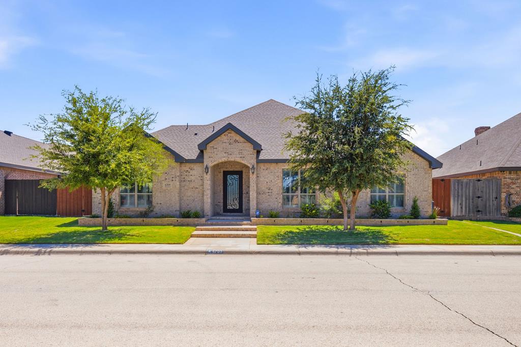 BREATHTAKING IN GRASSLAND WEST! OFFICE/STUDY AT THE ENTRY WITH A WALL OF BUILT-INS! A GOURMET KITCHEN WITH EVERYTHING YOU WILL EVER NEED- DOUBLE OVENS, GAS COOKTOP, ICE MAKER, TONS OF COUNTER SPACE AND ADJACENT DINING AREA! HUGE LIVING AREA WITH A HIGH VAULTED WOOD BEAM CEILING & FIREPLACE! SEQUESTERED MASTER WITH A FABULOUS BATH - DUAL SINKS, JETTED TUB, WRAP AROUND WALK-IN CLOSET & A MAKEUP VANITY! EAST SIDE OF HOME OFFERS 2 BEDROOMS WITH JACK & JILL BATH! WEST WING OFFERS THE 4TH BEDROOM & FULL BATH, MAKES A GREAT IN-LAW PLAN OR BONUS ROOM! BEAUTIFUL BACKYARD WITH 2 PATIOS! FOUR CAR GARAGE!