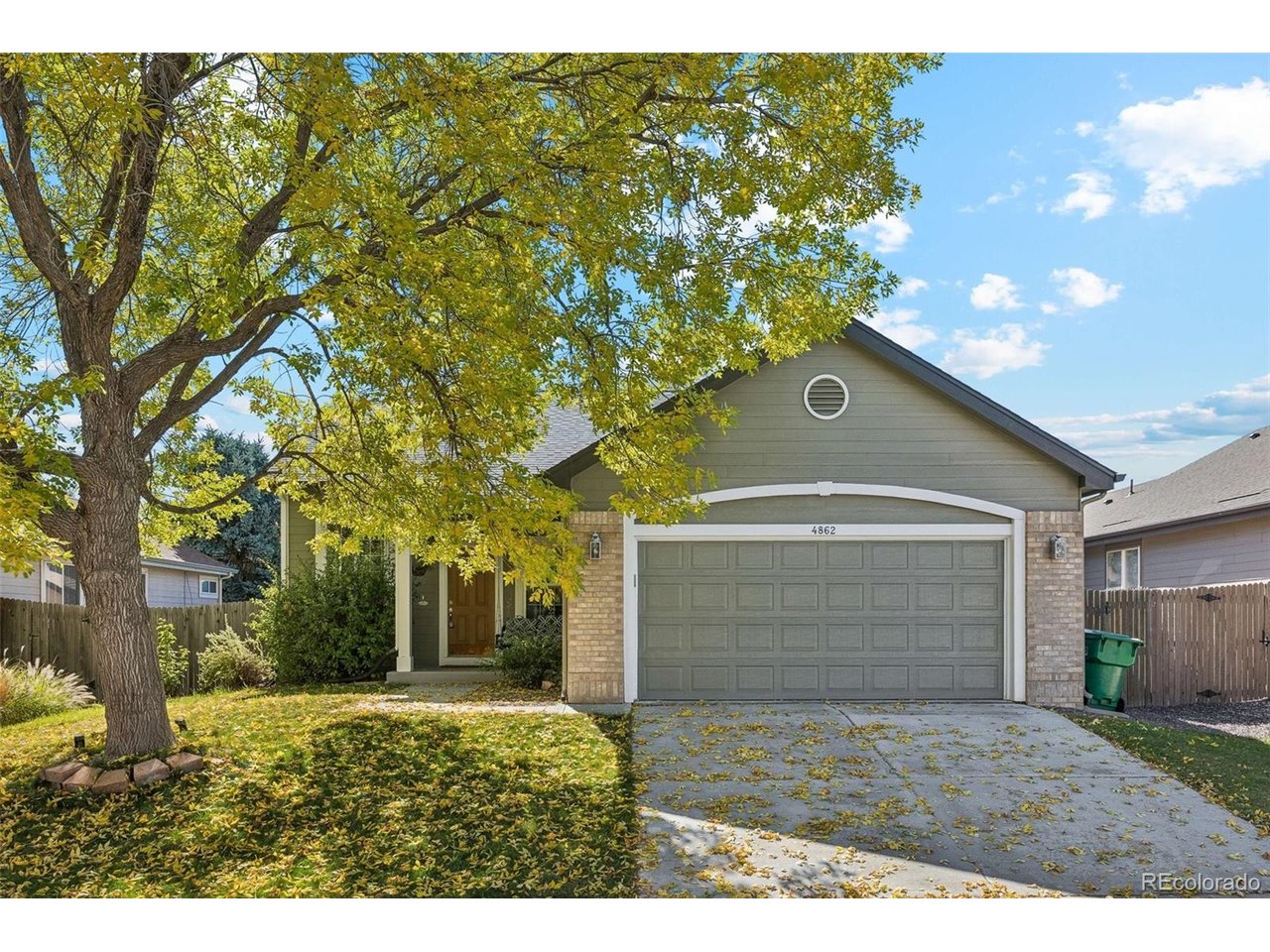 Welcome to this beautifully updated home featuring extensive improvements, mature landscaping, and a well-maintained neighborhood. Since 2023, the owners have invested in numerous upgrades, including a new furnace, water heater, refrigerator, microwave, washer, dryer, and range. The kitchen features updated countertops, sink and new flooring. The home has beautiful engineered hardwood flooring and plush, high-quality carpeting throughout the bedrooms and basement. The exterior was freshly painted in 2025, while nearly the entire interior has been repainted within the past three years, including recent touch-ups to walls and trim. Outside, enjoy established trees, mature shrubs, perennial flowers, and climbing vines that bring color and character to the landscaping year after year. The home also features an upgraded roof, providing additional peace of mind. Located in a welcoming neighborhood, this property offers exceptional value with an affordable HOA of just $210 per quarter, covering trash, sewer, and snow removal. With extensive updates already completed, this move-in-ready home offers comfort, convenience, and lasting value.