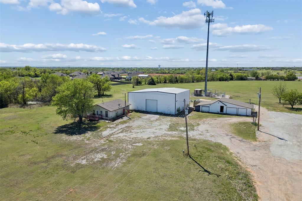 Rare commercial opportunity you don't want to miss! This versatile 4,576 sq ft property situated on a sprawling 2-acre lot along S Sunnylane Rd in Oklahoma City offers the ultimate live-work setup with a massive, open-span shop structure and an on-site residential house — all under one ownership. The expansive shop is purpose-built for heavy equipment storage, fleet operations, automotive, fabrication, contracting, or virtually any trades-based business, featuring generous ceiling height and wide access to accommodate serious commercial use. The additional on-site house structure provides incredible flexibility as a caretaker residence, private office, or potential rental income opportunity. With 2 fully usable acres, there is ample room to store equipment, expand operations, or add future structures — making this a true value-add asset in a rapidly growing OKC corridor. Positioned with convenient access to major thoroughfares and the broader Oklahoma City metro market, this dual-use commercial parcel is an increasingly rare find at any price point. Whether you're an investor, entrepreneur, or owner-operator ready to bring your business home, this property delivers unmatched upside, immediate operational potential, and long-term appreciation in one of the nation's most business-friendly markets. Properties combining commercial infrastructure, on-site living, and open acreage this close to OKC move fast — schedule your private showing today!