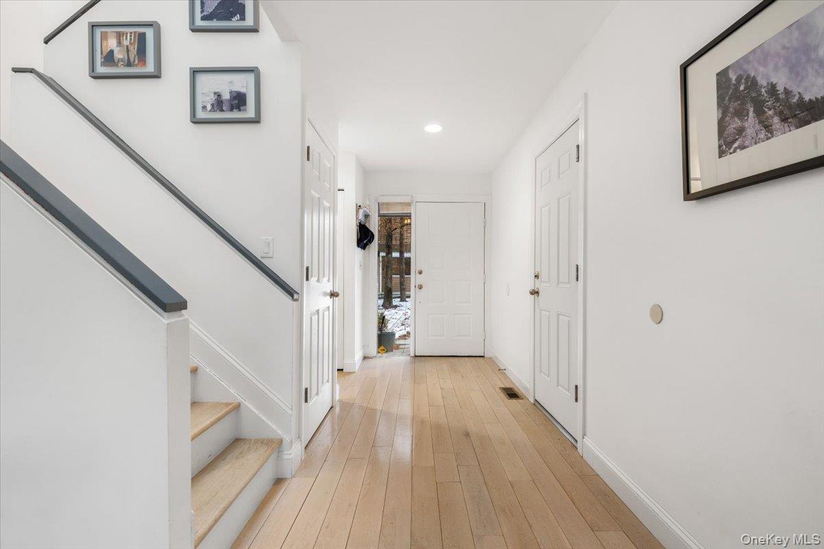 Welcome to 23 Waters Edge, a delightful three-bedroom, two-and-a-half-bath home in the sought-after Old Farm Lake community in Chappaqua. This natural light-filled residence features an open floor plan with sliding doors that lead to a private patio—perfect for relaxed, easy living. Ideally located in the complex, this home enjoys privacy along with proximity to the community amenities.The open kitchen, dining, and living areas create a cozy yet modern atmosphere, ideal for both everyday living and entertaining. This level also offers excellent storage and a convenient powder room and access to the one car garage.Upstairs, you’ll find two well-proportioned bedrooms sharing a hall bath, along with a serene primary suite complete with a spacious walk-in closet and a beautifully renovated bathroom. Recent updates include windows, enhancing both comfort and efficiency, washer/dryer, dishwasher and AC condenser.Ideally located less than a mile from Chappaqua’s vibrant village and Metro-North train station, this home offers the perfect blend of privacy, convenience, and lifestyle. Welcome home.