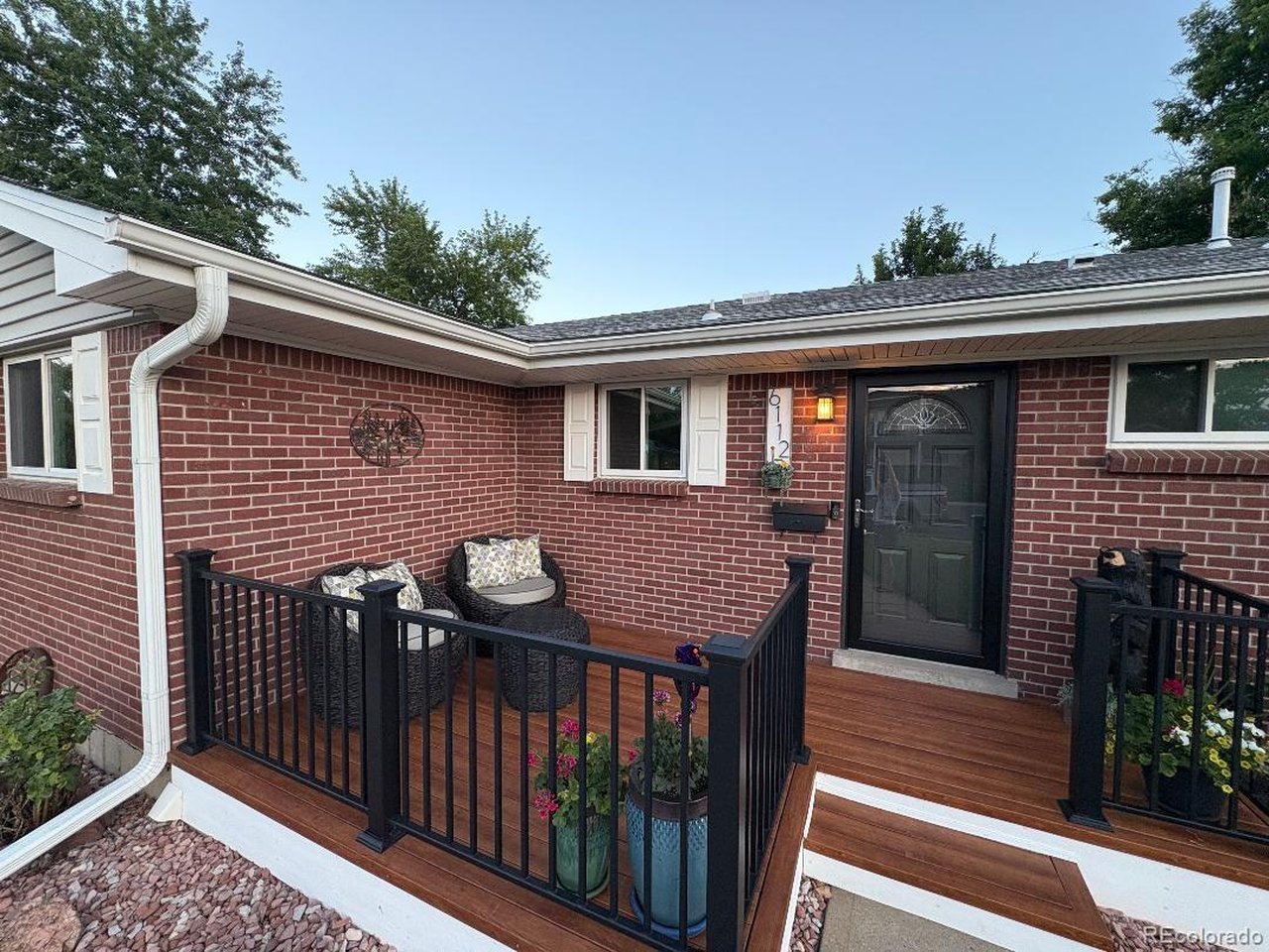 OPEN HOUSE Sat 05/16 11am-2pm.**PERFECTION INSIDE & OUT** Don't miss this opportunity! Welcome to this exquisitely designed & fully updated home in highly sought after Arvada! This beautiful home perfectly blends comfort, style, and functionality. Turn the key & everything about this home is ready for you. From the moment you arrive on the property you'll notice the attention to detail w quality upgrades everywhere. Enter the front patio and you'll want to sit & enjoy the front yard. Come inside and you will realize it is perfect condition inside & out. The inviting kitchen space is a true centerpiece, featuring gorgeous granite countertops, ample cabinet space, plenty of room for cooking & entertaining in the spacious dining area that draws you to the beautiful living room w wood burning fireplace. Boasting stunning luxury vinyl plank flooring, like-new carpet, and fresh interior & exterior paint, creates a bright and modern feel in every room. Three bedrooms have oversized closet space. Note the design quality bathroom. Downstairs, the fully finished basement includes a guest bedroom & bathroom, dedicated workout room, spacious room for playing or relaxing with family & friends, massive storage area & laundry w utility sink. Step out to your backyard oasis! Enjoy professional landscaping meticulously planned for easy yard maintenance, beautifully designed patio, raised garden ready space, exterior lighting included, spacious shed. Yard ready for fun. Ideal for both entertaining & unwinding year-round you'll be spending any leisure time outside! Additional highlights include concrete pad parking space & 50 amp plug for charging EV & Recreational Vehicle, Paid Off Solar Grid that offsets 100%+ of electric costs, New Furnace, deep set garage for extra storage, Outdoor Shed, and the list goes on. Location is tops! Walk to Secrest Apex Center Park & Pool-15 mins NW to Boulder-15 mins SE to Denver-15 mins SW to the Rocky Mountains. Old Town Arvada only a mile away!