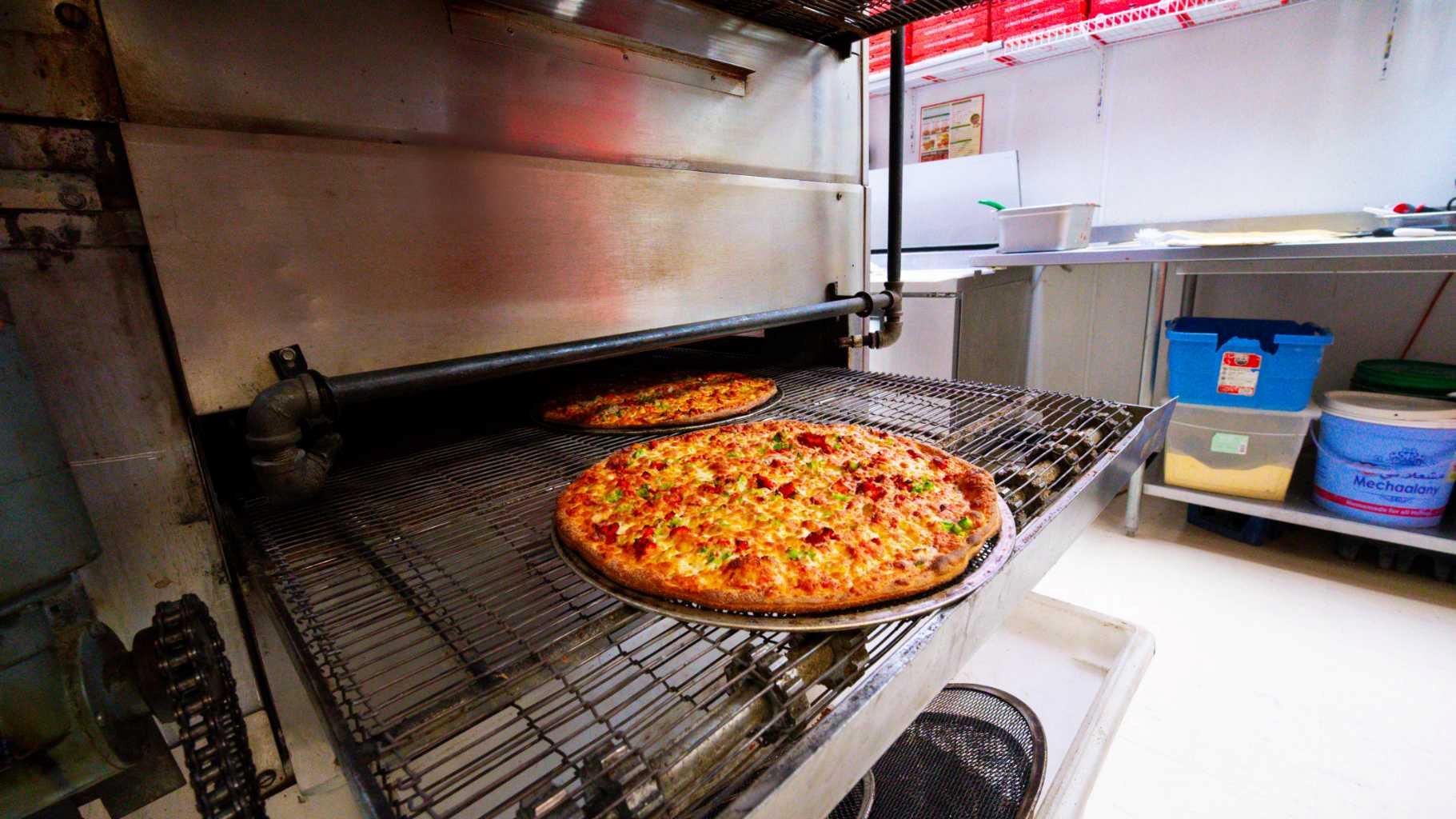 Great Proven Sales well established Pizza & Donair Franchise In Marda loop south west posh area of calgary ,all appliances included take over running business and take home Good Income plus be your own boss ,very low rent and long term lease ask your realtor for more details