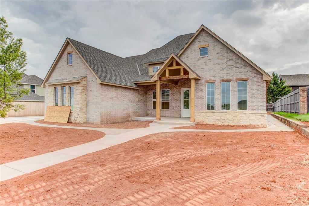 Welcome to 1913 Providence Dr. in the highly sought-after Hallbrooke neighborhood of Norman! Offered at $634,500, this stunning 2,907 sq. ft. home blends luxury, functionality, and timeless design with 4 bedrooms, 3 bathrooms, and an oversized side-entry 3-car garage. From the moment you walk in, you'll be greeted by soaring vaulted ceilings that extend seamlessly from the living room through the covered back patio, creating an open, airy feel with an abundance of natural light pouring in through the home's many oversized windows. The heart of the home is the impressive chef's kitchen, featuring a massive quartz island, abundant cabinetry, stainless steel appliances, a 48-inch professional gas range, built-in oven, built-in microwave, dishwasher, and an oversized walk-in pantry complete with extensive storage and a dedicated workspace.Thoughtfully designed with both style and comfort in mind, the home showcases engineered wood flooring, beautiful tile selections throughout, and high-end finishes in every room. The oversized third bedroom offers exceptional flexibility, matching the size of the primary suite and making it perfect as a second living area, game room, media room, or guest retreat. The luxurious primary suite is a true escape, featuring a spa-inspired bathroom with a freestanding soaking tub, an expansive walk-in shower with a rainfall showerhead, dual vanities, and an extra-large walk-in closet. Additional highlights include generous storage throughout, a spacious oversized 3-car side-entry garage, and a corner fireplace on the back patio. If you've been searching for a home that offers premium finishes, exceptional living space, and thoughtful design in one of Norman's most desirable neighborhoods, 1913 Providence Dr. is one you won't want to miss.