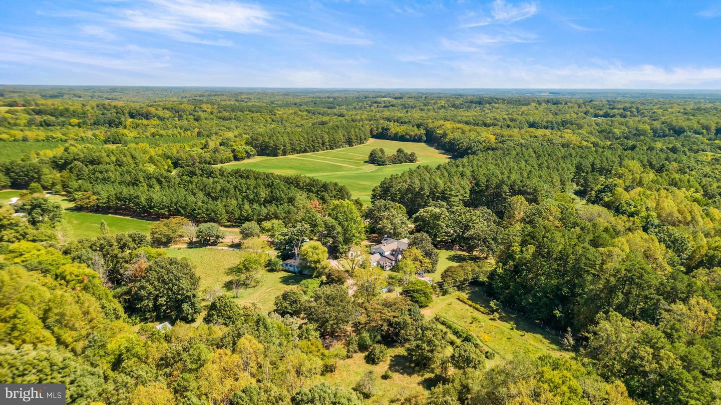 574.40 unified acres across 9 parcels with frontage on Kentuck Rd, Laurel Grove Rd, and W. Hightower Rd. Offering more than 250 acres of mature Plantation Pines and mixed hardwoods, 60 acres of cropland, 15 acres of open space, three ponds, and nearly 4 miles of internal roads and trails, this Kentuck estate supports hunting, forestry, recreational, residential, and potential development options. The main home, a Southern Colonial dating back to 1881, anchors the homestead, accompanied by a tenant house, stable, cabin, equipment sheds, and various additional outbuildings. Multiple parcels are enrolled in Land Use, keeping annual carrying costs well below full market rate. Suited to agricultural operators, timber investors, conservation buyers, or a private estate seeking scale and privacy within reach of Danville, Greensboro, Raleigh, Charlotte, Charlottesville, Fredericksburg, and Washington, D.C. Sold as an assembled portfolio.