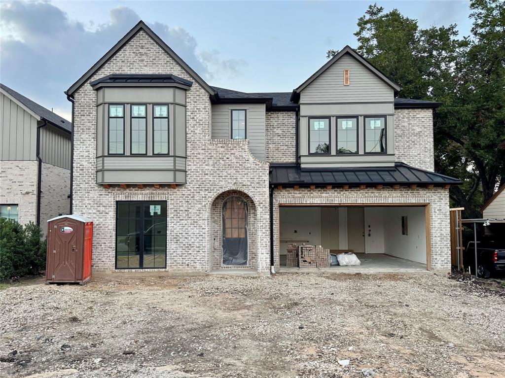 Nearing completion this is the last of seven custom homes by Fairmont Homes on this coveted block - making this a rare opportunity you won’t want to miss. Perfectly positioned within walking distance of Lakewood’s premier amenities, this breathtaking transitional home offers unmatched access to the SoPac Trail,White Rock Lake,& Ridgewood Park - a dream location for outdoor enthusiasts. Expertly crafted by Fairmont Homes, this residence sits on an oversized 55x170 lot surrounded by high-end new construction, blending timeless elegance with modern comfort. The exterior boasts natural brick detailing that lends an established, enduring presence. Inside, luxurious designer finishes abound - from white oak hardwood floors & smooth-finish walls to elevated lighting & rare quartzite & marble surfaces.The heart of the home is the stunning kitchen, featuring a double island, integrated panel-front JennAir Professional appliances (including a 48-inch range),white oak cabinetry,& a spacious walk-in working pantry - a true showstopper.Thoughtfully designed with an open-concept layout,the kitchen seamlessly flows into the dining & family rooms, all overlooking the resort-style backyard.Step outside to a covered loggia with an outdoor kitchen, a sparkling pool,& a large turf yard — ideal for year-round enjoyment.Don’t miss the striking wet bar just off the living room.The main level also features a private guest suite, a stylish powder bath, & a functional mudroom. Upstairs, the luxurious primary suite offers vaulted ceilings with views of the backyard and pool, a spa-inspired bath,& a generous walk-in closet. Each secondary bedroom includes its own en-suite bath & walk-in closet, complemented by a large game room & a beautiful study for work or quiet retreat. Additional highlights include an oversized two-car garage pre-wired for an EV charger and energy-efficient upgrades for year-round comfort and sustainability.