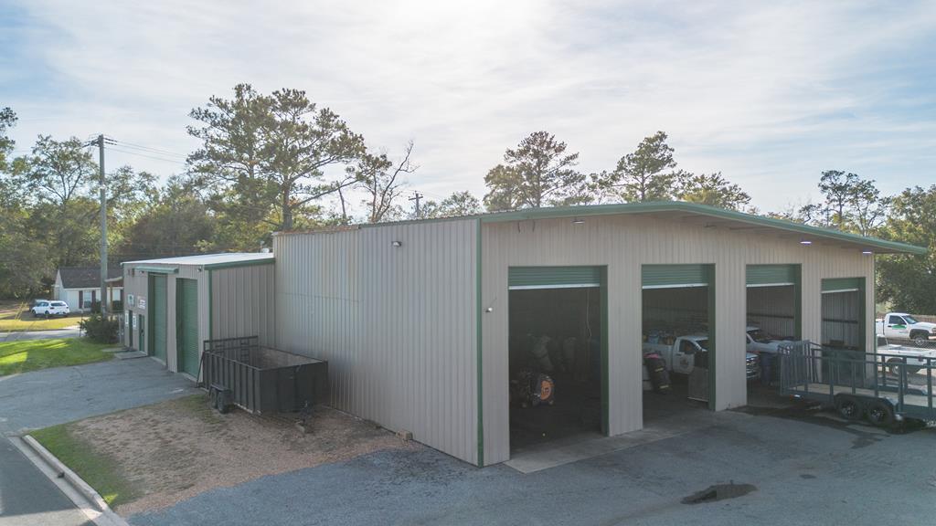 Warehouse + Office Space — Endless Business Potential  Discover an incredible opportunity with this well-kept commercial warehouse featuring 400 sq. ft. of office space and 7,110 sq. ft. of warehouse/storage area. This versatile property is designed to support a wide range of business operations and offers exceptional functionality both indoors and out.   Property Highlights  Total: 7,510 sq. ft. of usable space  400 sq. ft. dedicated office — perfect for admin, client meetings, or onsite management  7,110 sq. ft. warehouse/storage — wide-open layout with very high ceilings  Six (6) bay roll-up doors for easy access and efficient workflow  Large fenced-in outdoor parking/storage yard ideal for equipment, vehicles, materials, or fleet parking  Property has been well maintained and is ready for immediate use  Excellent flexibility for a variety of business types   Perfect For:  Mechanics & auto repair  Landscaping companies  Logistics & delivery services  Construction companies  Storage operators  HVAC, plumbing, electrical businesses  Any operation needing ample storage, vehicle access, and workspace  Bring all your potential buyers — this property delivers space, access, security, and endless possibilities for the right business.