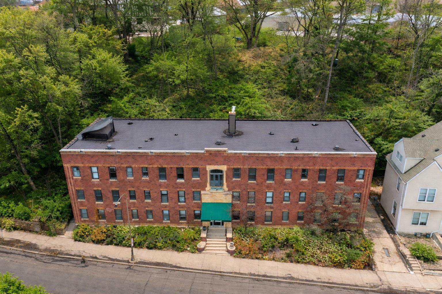Welcome to an exceptional investment opportunity in the heart of St. Paul! This charming three-story, 19-unit apartment building is perfectly situated on historic Grand Ave, elegantly perched on a hill that offers breathtaking views. This well-maintained building features original hardwood floors throughout, showcasing the timeless craftsmanship and architectural character that defines this beautiful property. The spacious units comprise 12 studio apartments and 7 one-bedroom apartments, each benefitting from great natural light and stunning views through large windows. Key features include:Vacant building ready for new ownershipRecent upgrades, including a newer boiler and roof, ensuring efficiency and reliabilityClean and well-kept interiors, inviting a variety of potential usesGreat layout with large unit sizes, allowing for versatile living arrangementsHistorically, the property served as a supportive housing medical facility, creating an ideal opportunity for the new owner to continue in that capacity or transition to market-rate apartments, sober housing, supportive housing, or other beneficial uses. Don’t miss the chance to acquire this fantastic investment on Grand Ave, where charm meets modern updates, all while being surrounded by scenic views and the vibrant community of St. Paul.