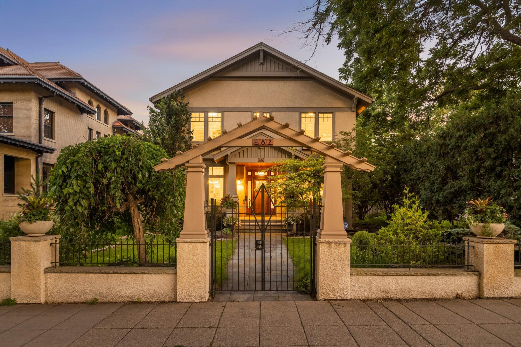 A rare find! A gorgeous 25-year-old home on Historic Summit Avenue! Experience timeless charm and modern comfort in this exceptional Arts and Crafts-style home, built in 2000 with top-of-the-line materials and impeccable craftsmanship. Located in the heart of the sought-after Summit Hill neighborhood, this custom-designed home features solid wood trim throughout, honoring the character of its historic surroundings while offering all the benefits of newer construction. The spacious main level offers a perfect blend of openness and purpose, with a flowing floor plan that includes a formal dining room, private office with built-in bookshelves, and a sunny south-facing sunroom that opens to a spacious and private backyard.

The second level hosts an expansive primary suite offering a true retreat with in-floor heated bathroom, soaking tub, separate shower, two large walk-in closets, and vaulted ceilings. In addition, there is an ample laundry room, two additional sizable bedrooms with great closets sharing a generous four-piece bathroom.

The newly updated lower-level features luxury vinyl plank flooring throughout, a large family room with many built-ins, a cozy gas fireplace, two additional bedrooms, currently used as fitness spaces, and a versatile flex space complete with a custom queen-size Murphy bed—ideal for guests. A  large utility room provides a second laundry area and storage galore.

Step outside to your own private oasis: a deep, landscaped yard with a maintenance-free deck and a stunning stamped concrete patio with custom pergola. A bit further down the lot you can enjoy the beautiful patio space with a heated inground pool that was re-tiled this spring and has a year old hydraulic cover. Finally, don’t miss the attached three-car heated garage—with an e-charge station; a true Summit Avenue rarity.

 Located in the Summit Hill neighborhood close to parks, playgrounds, shopping, dining and more! Walking distance to all that Grand Avenue and the Cathedral Hill areas have to offer! A rare opportunity to own a newer home in one of Saint Paul’s most cherished historic neighborhoods!