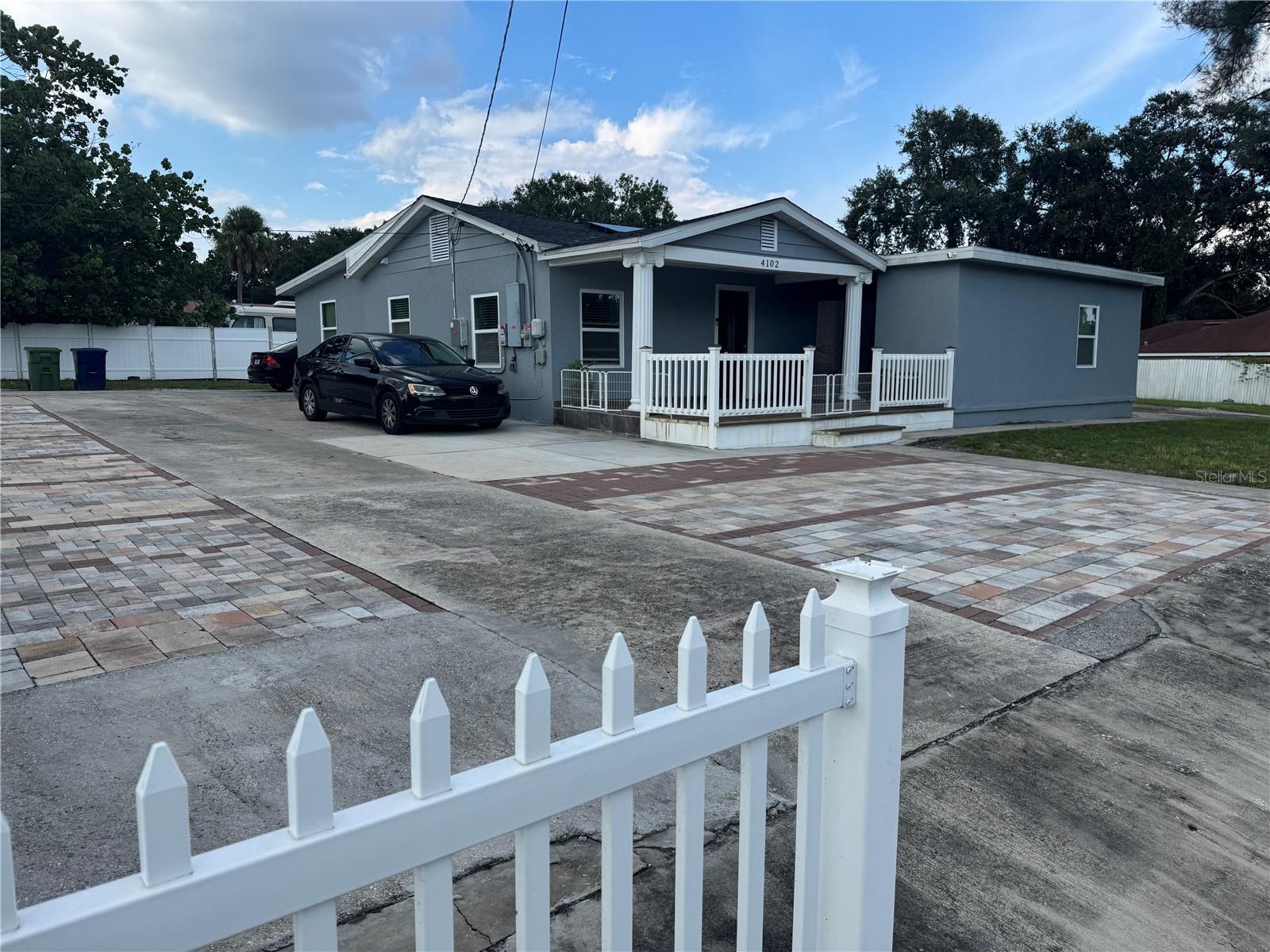 A single-family, one-story residence built in 1947, with approximately 1,724 square feet of living space and situated on a 0.32-acre (roughly 14,000?sq?ft) corner lot.  It offers 4 bedrooms and 2 full bathrooms, and includes a variety of interior appliances such as a dishwasher, dryer, garbage disposal, microwave, range/oven, and refrigerator. The home features laminate flooring.
Exterior amenities include an attached garage, covered front and rear porches, chain link fencing, and additional structures like a shed and workshop