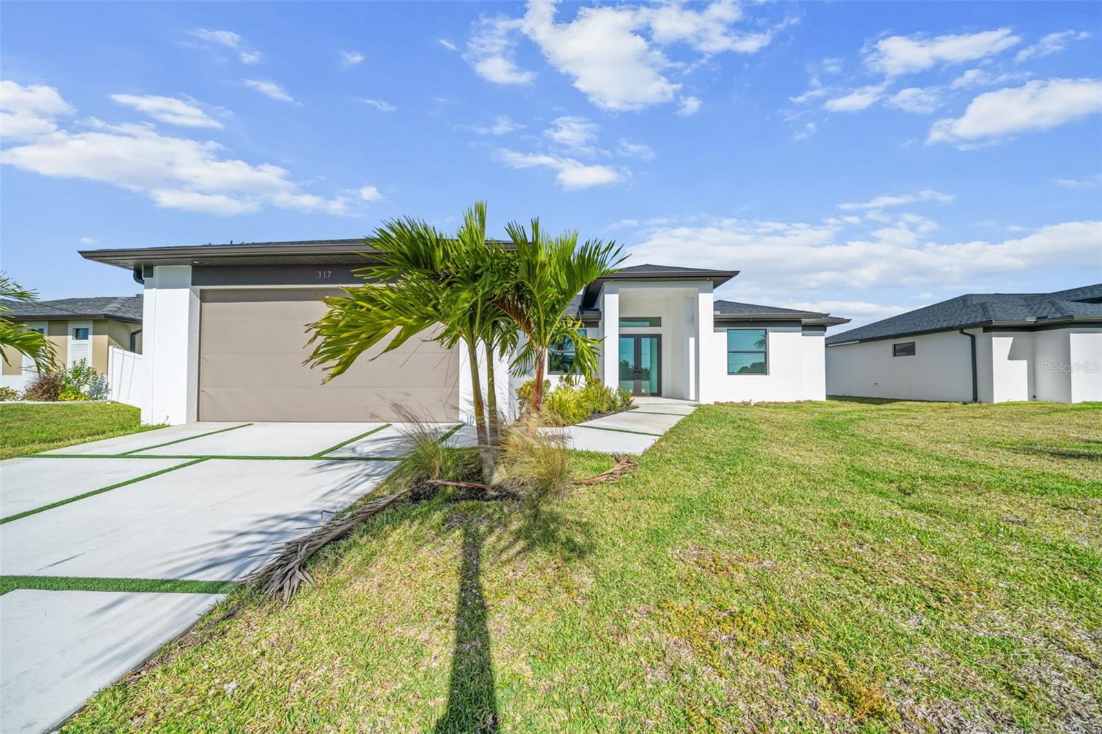 Step into modern Florida living with this beautifully designed brand-new 3-bedroom plus den, 2-bath home offering 1,893 sq. ft. of spacious, open-concept living. The versatile den is ideal for a home office, media room, or guest space, providing flexibility to fit your lifestyle. The thoughtfully designed kitchen flows seamlessly into the living and dining areas, creating the perfect setting for everyday living and entertaining. The kitchen's walk-in pantry adds extra storage space for organization. The primary suite offers a peaceful retreat with a spacious walk-in closet, a well-appointed en-suite bath and separate lanai. Complete with a 2-car garage and situated on a desirable dry lot, this home is conveniently located near shopping, dining, schools, and major roadways. Whether you're looking for your primary residence, a seasonal getaway, or an investment opportunity, this home is ready to impress. Connected to City Water & Sewer, NO HOA FEES, Seller incentives available to use towards closing costs or buying down interest rate points.