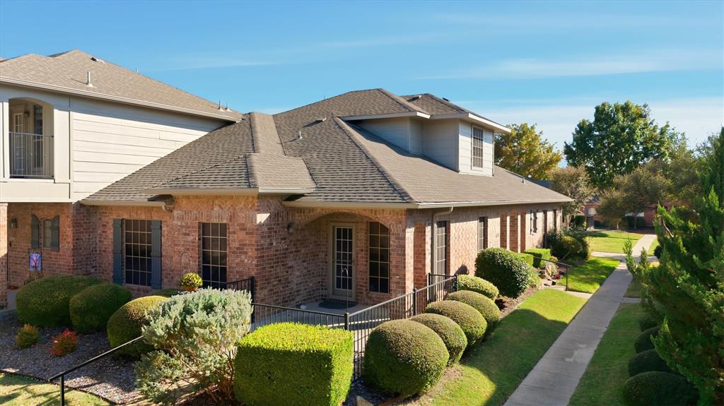 Make this your NEW HOME FOR THE HOLIDAYS with private suites for everyone!!! Nestled in the secured, GATED COMMUNITY of the sought-after Villas of Westridge and within award winning Frisco ISD, this IMPECCABLY MAINTAINED TOWNHOME offers both elegance and functionality. Beautiful HARDWOOD FLOORS paired with elegant PLANTATION SHUTTERS throughout enhance the home’s timeless charm. The OPEN-CONCEPT kitchen showcases GRANITE COUNTERS and flows seamlessly into the living and dining areas making it perfect for entertaining. This RARE FLOORPLAN with three primary bedrooms and three full baths, two conveniently located on the first floor and one upstairs, provides exceptional flexibility for any lifestyle. The SPACIOUS OWNER’S RETREAT on the main level includes a LUXURIOUS ENSUITE BATH with a garden tub, separate shower, and dual sinks. An OVERSIZED SECONDARY BEDROOM DOWNSTAIRS offers versatile use as a guest room, media room, or home office. A PRIVATE UPSTAIRS SUITE with ensuite bath and a dedicated loft office nook create an ideal retreat for family or guests. A LARGE STORAGE CLOSET with shelves adds to the home’s practicality. The OUTDOOR PATIO ENCLOSED BY AN IRON FENCE  provides a peaceful spot for morning coffee or evening relaxation. Residents of Villas of Westridge enjoy RESORT-STYLE AMENITIES, including a pool, park, gym, clubhouse, and more. CONVENIENTLY LOCATED near Westridge Golf Course, top-rated schools, restaurants, and shopping, This great MOVE-IN READY home has it all! The only thing missing is you!