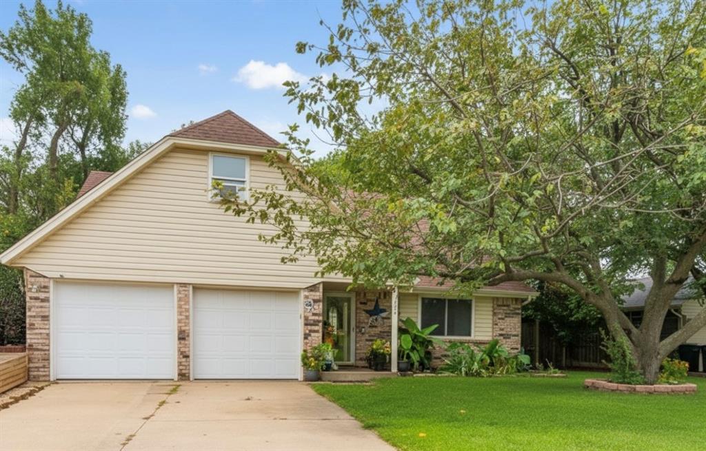 If you’re looking for space this home has it! This home boasts a flexible floor plan with 4–5 bedrooms, 2 full baths, and plenty of room to spread out.

The main level features a welcoming foyer with an open staircase, a spacious primary suite with handicap-accessible bath and oversized walk-in closet, plus a huge family room with a cozy wood-burning fireplace. The updated kitchen shines with granite countertops, and a large prep island, along with a convenient interior utility room.

Upstairs, you’ll find three generously sized bedrooms, a full bath, and a bright bonus room with skylights that is currently used as a 5th bedroom.

This home has newer windows, a water softener that filters the entire house, a 5-year-old HVAC system with programmable thermostat, and extra insulation for energy savings.