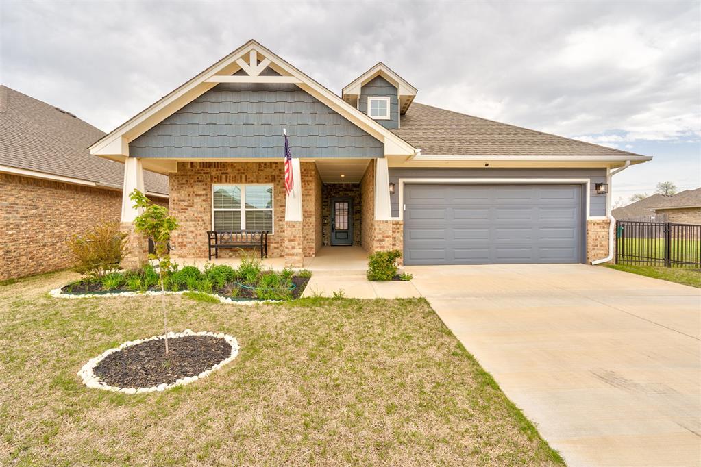 This meticulously maintained home in the gated Ponderosa Estates community, conveniently located just minutes from the Kilpatrick Turnpike and Northwest Expressway and within the Piedmont School District. Abundant natural light highlights the clean lines and modern finishes throughout the main living areas. The kitchen offers an ideal balance of style and functionality with quartz countertops, stainless steel appliances, ample cabinetry, and a seamless connection to the dining and living spaces. The primary suite provides a relaxing retreat with a spacious closet and a well-appointed bathroom featuring dual sinks, a soaking tub, and a separate glass-enclosed shower. Secondary bedrooms offer flexibility for guests, a home office, or everyday living. Enjoy outdoor living with a covered patio, low-maintenance yard, and the added benefit of a neighborhood pond, perfect for peaceful walks and relaxation.