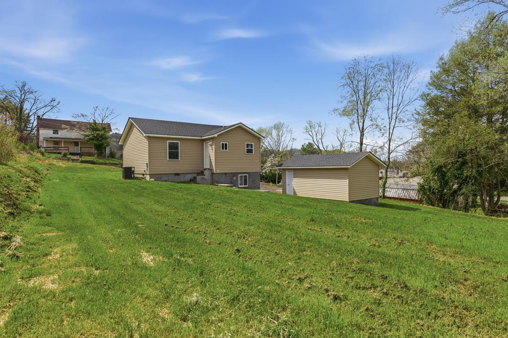 This home has had a complete update!!! Home is like new.  Awesome lot in with basement/workshop area. Detached 1 car garage.  This home has new floors, siding, windows, new kitchen and bath.