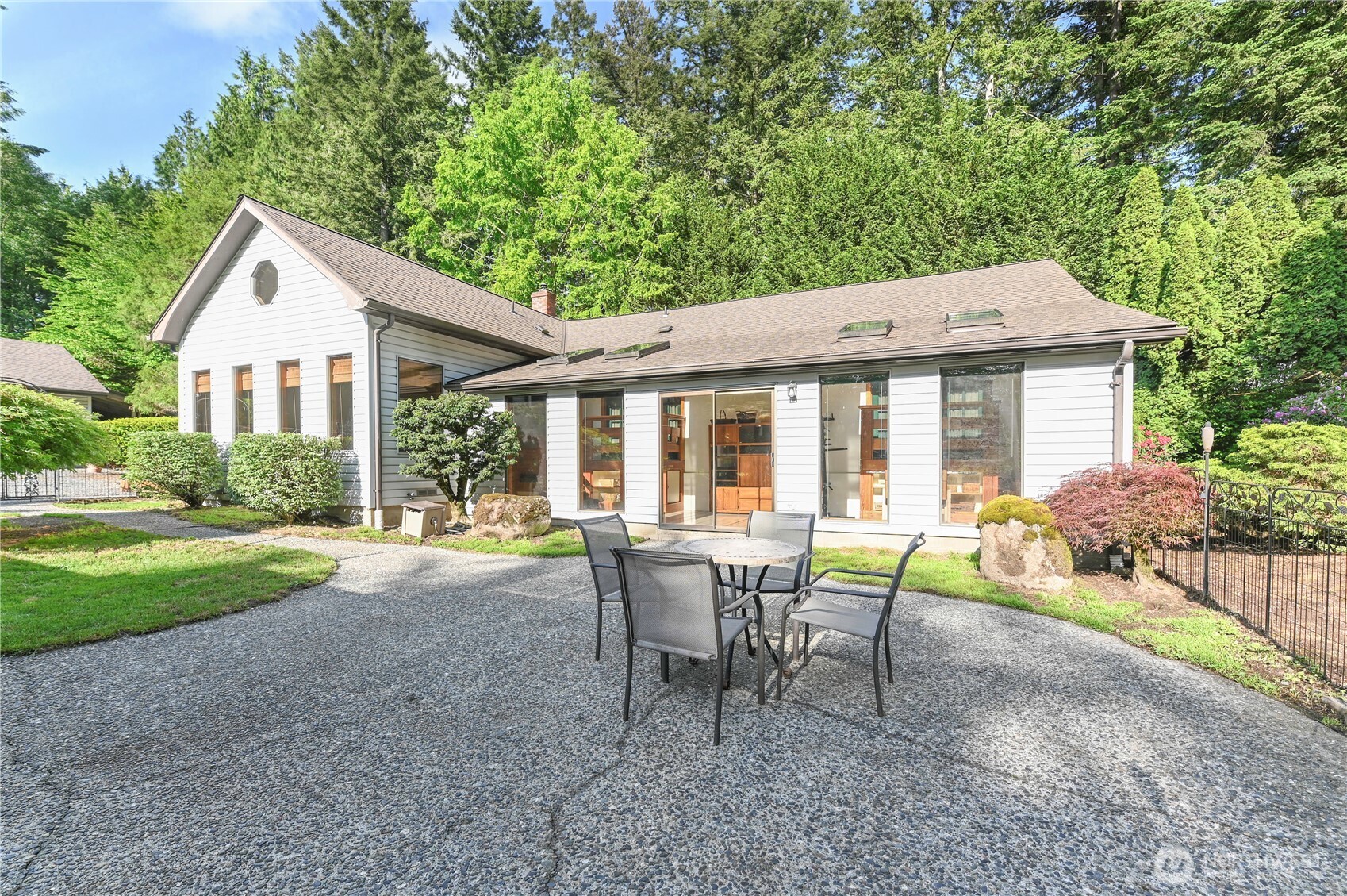 Live, Work & Thrive in One Perfect Place! Home, commercial building, land and business sold as one.  This rare Arlington offering combines lifestyle, income, and room to grow—all on one beautiful property. Nestled in a peaceful setting, the well-kept 2-bedroom home offers warmth and comfort, just steps away from a fully operational and respected dog kennel business. Featuring indoor/outdoor areas, potential grooming space, and a loyal clientele, the business is turnkey and ready for the next owner. The included vacant land offers room to expand, is equestrian-friendly, and makes this an easy decision. Bring your dogs, bring your horses—most of all, bring your dreams. Sold as one package. MLS #'s 2387428 (vacant land) & 2387679 (biz opp)