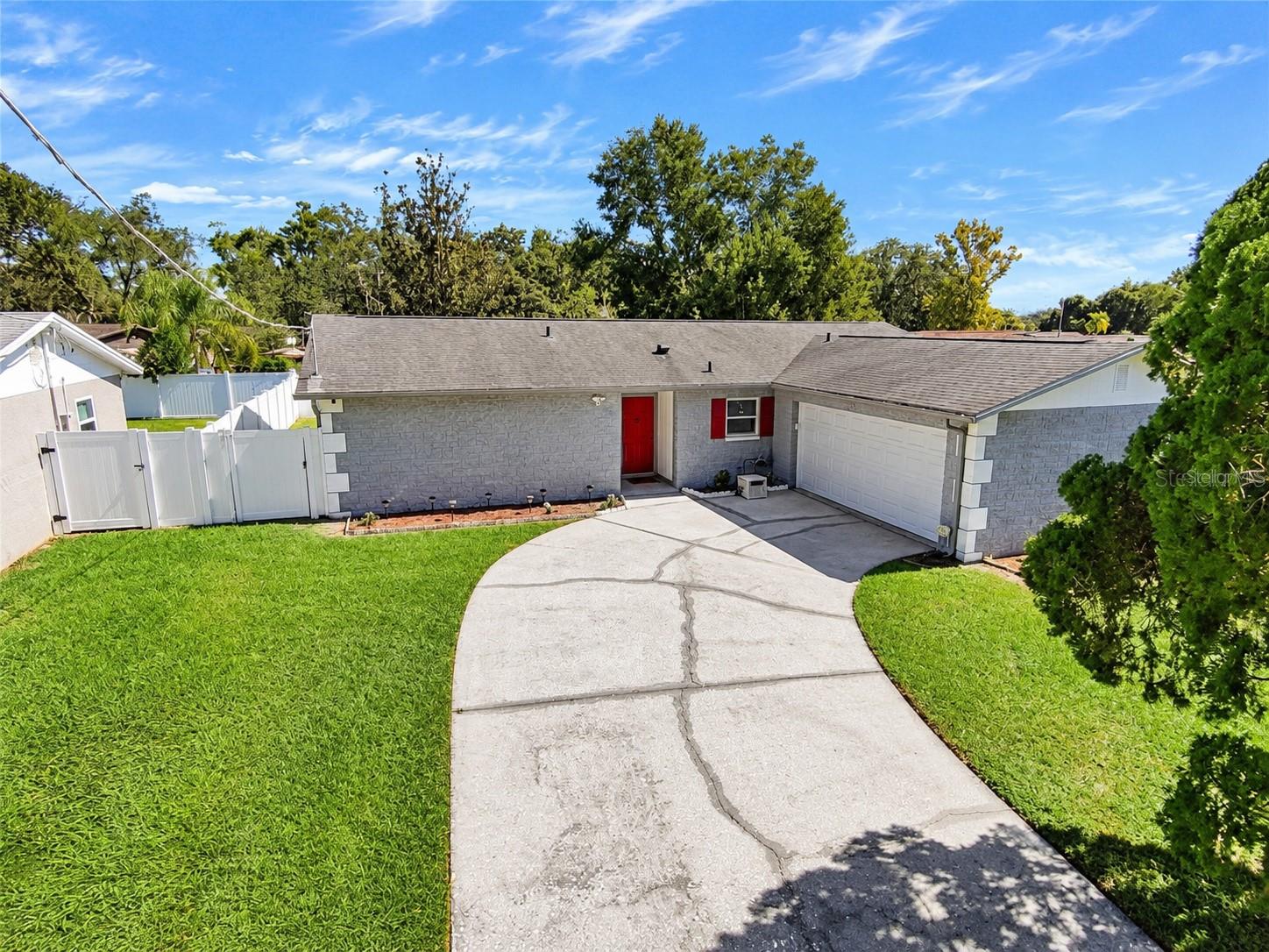 SELLER OFFERING ASSISTANCE TOWARD BUYER'S ALLOWABLE CLOSING COSTS AND/OR INTEREST RATE BUYDOWN WITH AN ACCEPTABLE SALES PRICE, SUBJECT TO LENDER APPROVAL! Discover this beautifully updated Brandon home, where thoughtful improvements, modern conveniences, and exceptional outdoor entertainment come together! Enjoy peace of mind with major upgrades already completed, including a roof installed in 2017, a fully replaced HVAC system in 2023, updated electrical panel and rewiring throughout the home around 2023, and a complete whole-home plumbing re-pipe completed in 2021. The plumbing system features a custom manifold with individual shutoff valves conveniently located in the garage, allowing water lines to be isolated for maintenance, repairs, or future improvement projects without shutting off water to the entire home. Security camera system built in and security system will convey with the home. The kitchen features a matching suite of Samsung appliances purchased approximately four years ago, while the primary bedroom offers a unique motorized roll-down closet system operated by remote control. Step outside into your own private backyard retreat, designed for relaxation, recreation, and entertaining! The impressive newly installed 20-by-18-foot Trex composite deck provides generous space for outdoor gatherings, while the recently installed H2X Fitness jetted swim spa, with an approximate original retail value of $30,000, delivers the enjoyment of a swimming pool with the added benefits of aquatic exercise and hydrotherapy. The swim spa also includes a cleaning system and exercise equipment for a complete at-home fitness experience. An outdoor wall-mounted flat-screen television beside the swim spa adds another layer of entertainment, creating an inviting setting for watching your favorite shows or sporting events while enjoying the Florida lifestyle. The fully fenced backyard features gated access on both sides of the home, providing added convenience and functionality. Ideally situated in Brandon, this property offers convenient access to shopping malls, grocery stores, restaurants, retail destinations, and everyday essentials, along with easy access to Tampa and approximately 15 minutes to downtown Tampa, depending on traffic. As an added bonus, furnishings throughout the home may be negotiable with the sale, offering an opportunity for a more convenient move-in experience. With its extensive improvements, versatile outdoor amenities, and desirable location, this home offers an outstanding combination of comfort, convenience, and Florida living!