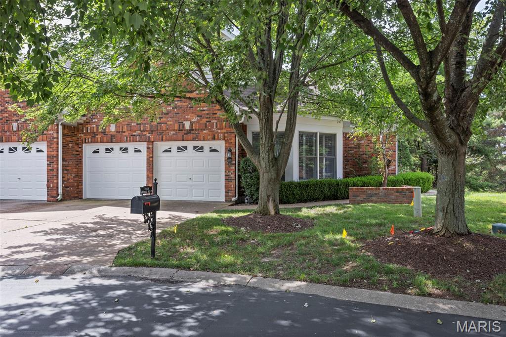 WELCOME HOME to this stunningly renovated 2 BDRM, 2.5 BTH villa with 3500+ sq ft in esteemed Amberleigh subdivision. This breathtaking villa has it all including a possible 3rd bedroom in the walk out lower level. Walk in to the sprawling open floor plan with TONS of floor to ceiling windows showcasing natural lighting throughout. Entry foyer leads to spacious vaulted great rm w/marble gas fireplace & vaulted wall of windows & sliders leading out to NEW deck (2025). Formal dining rm displays decorative wainscotting. Remodeled kitchen features NEW: 42" cabinets, built in whirlpool oven & microwave, gas cooktop, pantry & tile backsplash. Breakfast room is surrounded in floor to ceiling windows. Primary bedroom suite includes his & hers walk in closets & NEW (25) luxury bath w/HUGE his/hers vanities & custom tiled walk in shower. Main floor laundry w/utility sink, mudroom area w/desk & half bth on main floor. Make your way to the walk out lower level to find sprawling great room w/wet bar & floor to ceiling bookshelves. Add'l bedroom & den/possible 3rd bedroom adjoined to massive walk in closet. Full bathroom w/walk in shower in lower level. Featured throughout: new carpet & lighting (25), custom plantation shutters & window coverings. Also new: HVAC (19), water heater (18). LOCATION, LOCATION, LOCATION! These don't come available often, and that's because it's located within walking distance of all the shops & restaurants that Town and Country Crossing has to offer. MUST SEE!
