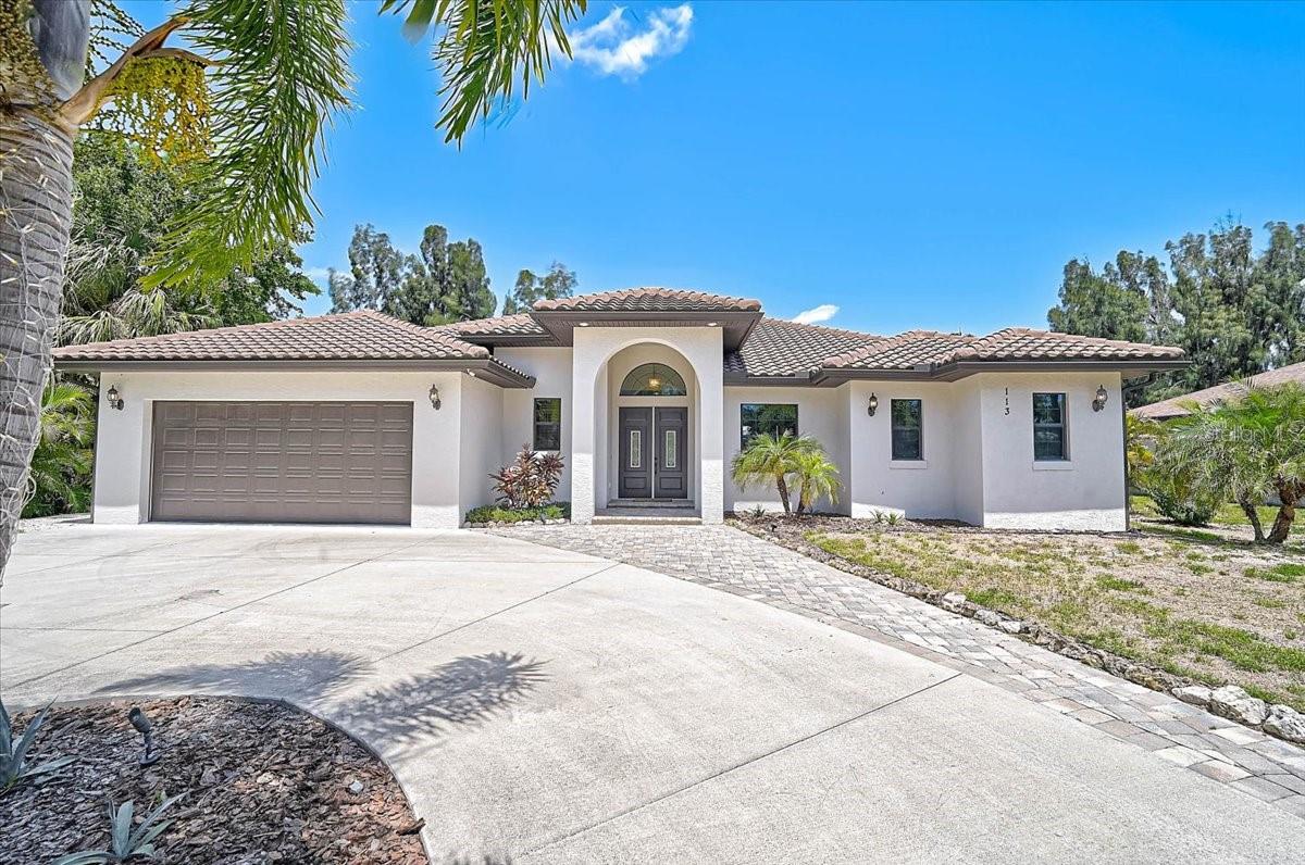 **DON’T WAIT TO BUILD!!  NEWER, CUSTOM-BUILT HOME (2020) IS MOVE-IN READY AND PACKED WITH UPGRADES** Situated on a generous 0.52-acre lot near the end of a quiet cul-de-sac, the property offers a private backyard and NO HOA fees/restrictions.  Bring Your Toys! Oversized circular driveway provides ample parking for a BOAT, RV, and additional vehicles. This Impressive Residence with 2502sf of heating living space, features 3 Bedrooms plus Study/Den, 2 Full and 1 Half Baths, and a 3-car tandem garage. The Light and Bright, Open Floor Plan is enhanced by tile flooring throughout, tray ceilings, and plantation shutters.  The expansive kitchen is designed for both everyday living and entertaining, featuring a large island, hardwood cabinetry, and premium stainless-steel appliances including Thermador, Bosch, etc. The owner’s suite offers a large, divided walk-in closet and a luxurious en-suite bath with dual vanities and a custom-tiled shower.  A spacious, screened lanai provides a beautiful view of the expansive, landscaped and private backyard while showcasing a Heated/Cooled, Saltwater Pool/Spa, along with a large, covered seating area and an Outdoor Kitchen BBQ, Quartzite countertop/sink —perfect for enjoying Florida’s outdoor lifestyle.  The Ideally located with easy access to US-41 (Tamiami Trail), this home is just a short drive to world-renowned beaches including Nokomis Beach and #1 rated Siesta Beach, shopping, dining, cultural attractions, and the highly rated Pine View School. **Please Enjoy Viewing the 3D VIRTUAL TOUR**