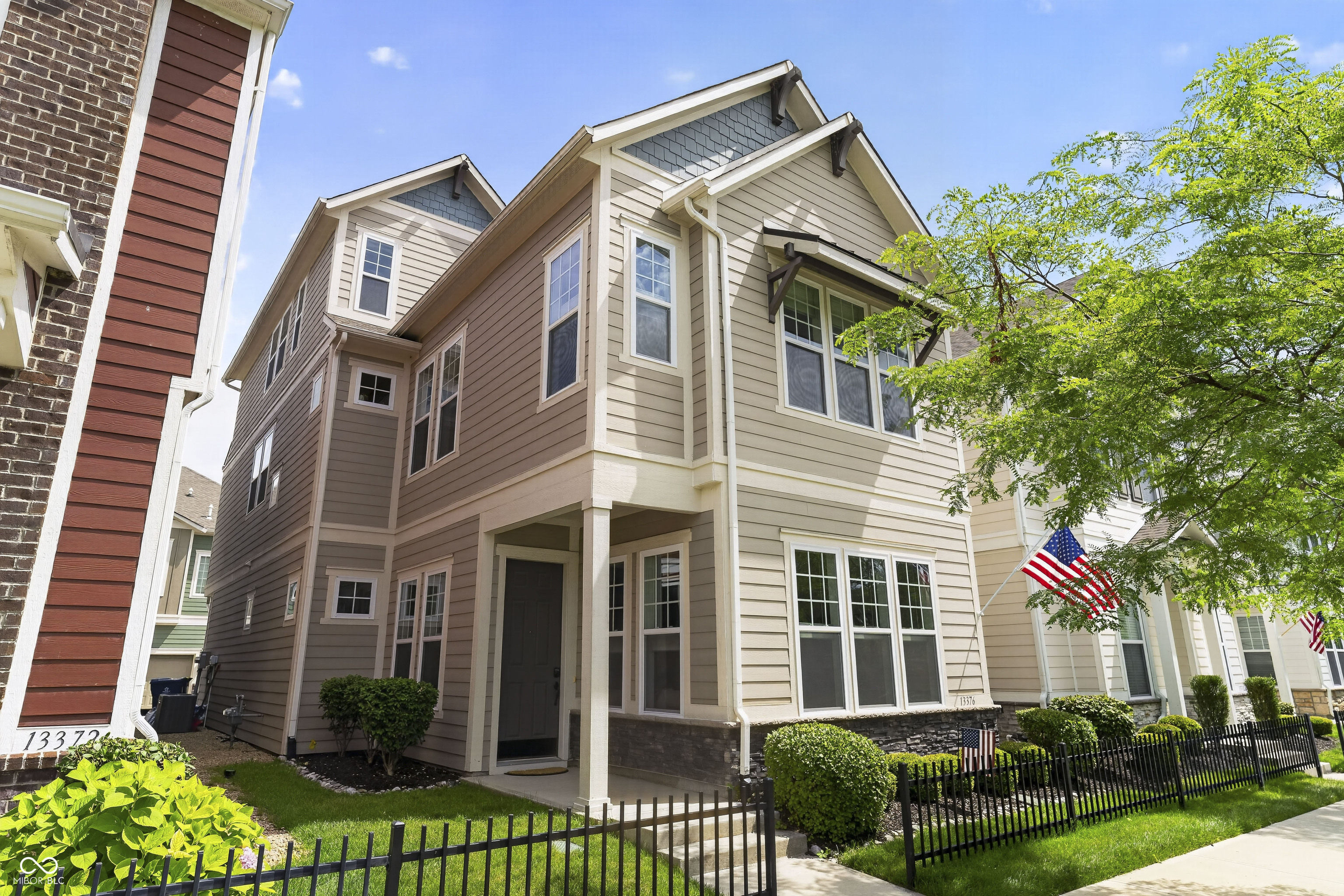 OPEN HOUSES FRIDAY, SATURDAY & SUNDAY!!! This 3 (could be 4) bedroom, 2 full 2 half bath David Weekley townhome in highly-coveted Saxony is a show-stopper! This 2018 build (only one meticulous owner) is turnkey ready with custom upgrades throughout. The high-ceiling main level boasts gorgeous LVP flooring matching the bannisters, granite countertops (including a large kitchen island), elegant black fixtures/handles, high-end white cabinetry, built-in ceiling speakers, a powder bath w window, fully-insulated high-ceiling garage w bump out, ceiling storage racks, & window. Enjoy the second level boasting a HUGE primary en suite w tray ceiling, top-of-the-line carpeting, enhanced tile work (floor-to-ceiling in the shower) & a closet large enough to be a bedroom. Large laundry closet w shelving right outside bedrooms for ease. Cozy nook w row of windows on 2nd level perfect for reading/office. Two spacious guest bedrooms w large closets round out the 2nd level. All bedrooms boast high-end, blackout top-down-bottom-up blinds. Need more space for an office, rec room or 4th bedroom? Head to the 3rd floor "lookout tower" w windows surrounding, a row of large bookshelves, & a half bathroom (easily convertible to a full). Exterior (concrete and stone work) sealed annually. Plenty of street parking available for family/friends. Saxony has it all - Pool, Parks, Playgrounds, Ponds (fishing/kayaking), a rentable event space, Donut shop, Dentist, Gym, Pizzeria & a Post Office! Close to I-69, Geist, Waterfront Park, Hamilton Town Center, 116th & Olio (shopping/dining), Ruoff Music Center, 2 Hospitals, multiple groceries, & the new Target! Short drive to IKEA, Top Golf, Fishers District & Downtown Fishers! It's all right here! Priced to sell. Come quickly!