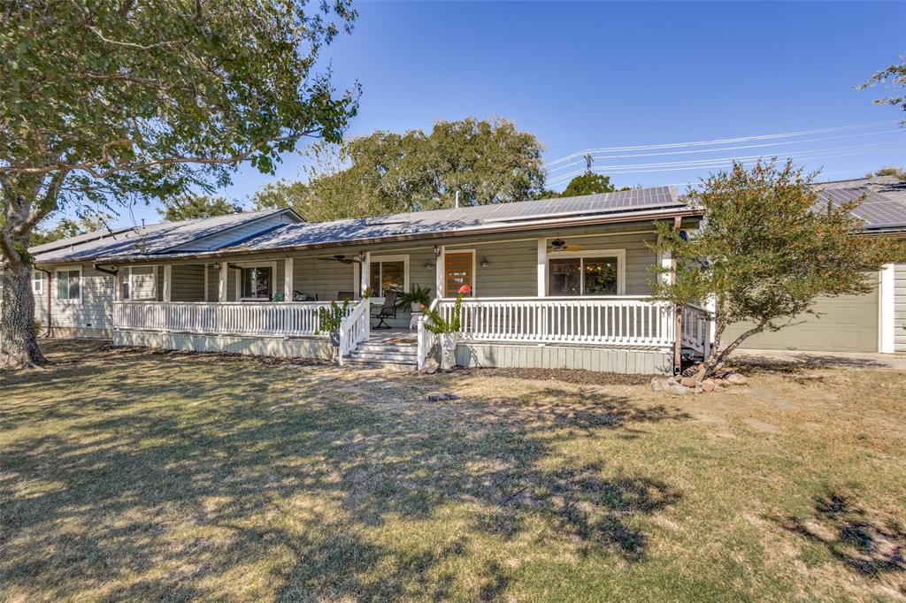 Incredible opportunity if you are looking for a multi-generational property, an investment property, or both! Over 1.2 acres in McKinney, and zoned to McKinney ISD, with easy access to SH 121, I-75, and Hwy 380. The main home offers over 2,400 sq ft with 5 bedrooms, 3 full bathrooms, and 2 living areas.  Flex space between kitchen and garage, currently used as a hair salon, is a great option for multiple uses.  You'll notice the beautiful wood flooring upon entry and immediately be drawn to the recently renovated kitchen.  Features include formal dining room, two living areas, one with a cozy fireplace and access to the back porch, and an over-sized laundry room.  Recent paint, door hardware, and bathroom faucets add to this already amazing home.  Solar panels save you on utilities, ensure you have power during outages, will be paid off by seller at closing. The 1,800 sq ft manufactured home includes 3 bedrooms, 2 baths, a formal dining area, and an over-sized back deck that can accommodate large gatherings. The split bedroom layout provides a private master suite separate from the other two bedrooms.  This is an ideal home for family, guests, or tenants.