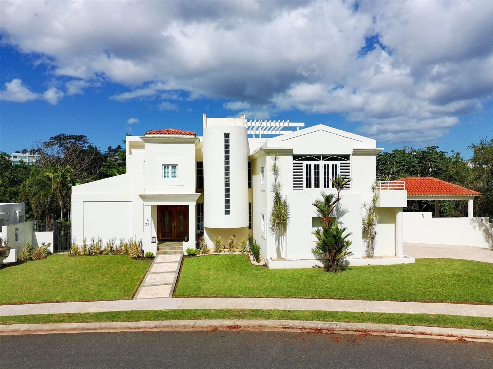 Parque Forestal, San Juan, PR: A rare expression of luxury, where nature and design exist in perfect harmony.A private oasis in the heart of the city, featuring the extraordinary presence of a majestic Ceiba tree within your own grounds, a truly irreplaceable and soulful element of the property.Parque Forestal, San Juan, Puerto RicoAsking Price: $1,350,000Living Space: 3,178 sq ftTerraces: 4 distinct outdoor living areasLot Size: 1,409 m²Property Taxes (CRIM): $801.92 (semi-annually)HOA: $291/monthProperty Highlights4 Bedrooms | 4 BathroomsElegant gazebo ideal for entertainingPrivate lower-level suite beneath the gazebo—perfect as a guest house, gym, or creative studioElegant Lounge areaEnclosed garage for 2 vehicles + additional outdoor parking for 3Additional FeaturesBrand-new 14kW diesel generator by Caterpillar6 high-efficiency inverter air-conditioning units