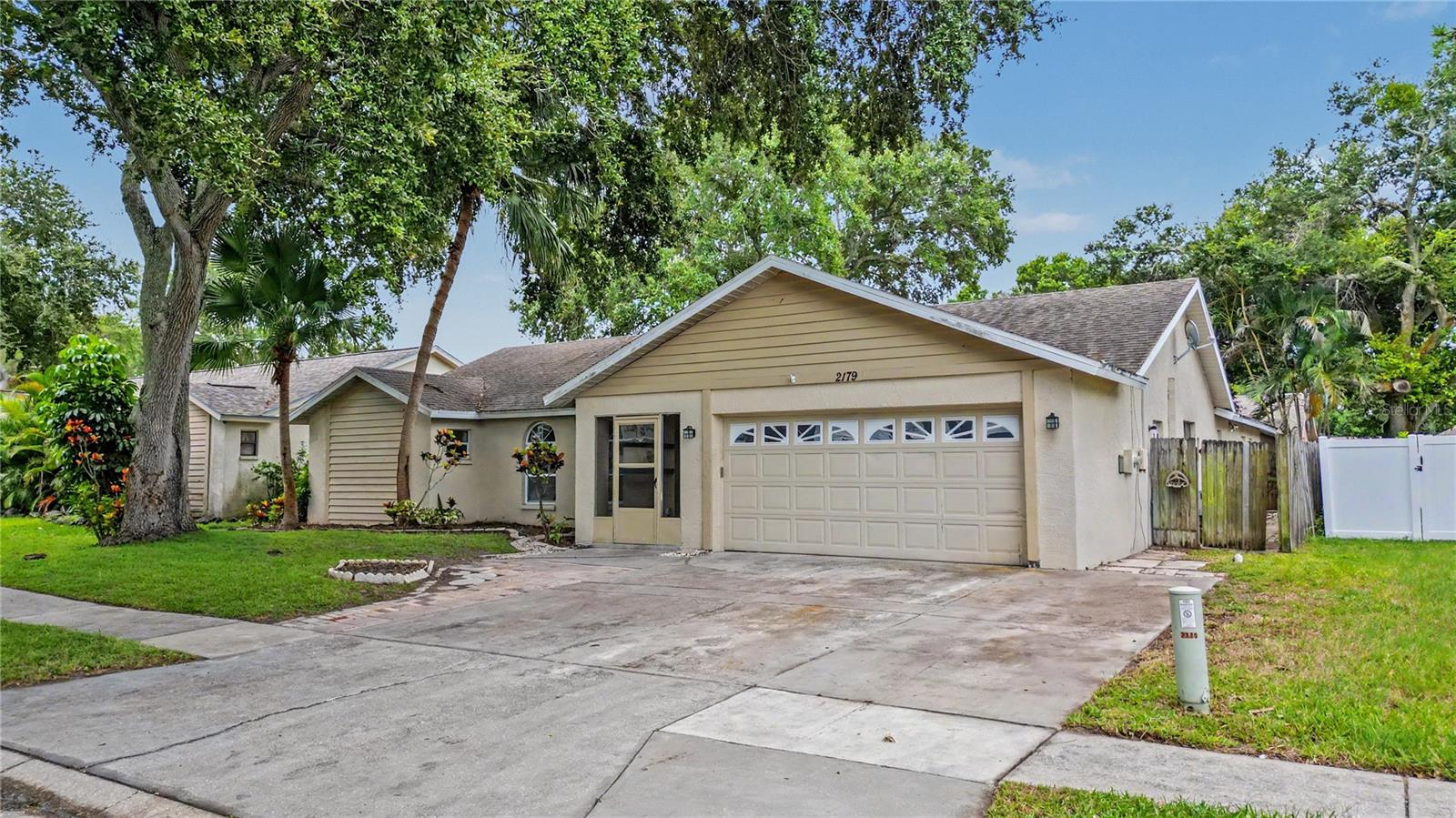 Great bones, a fantastic layout and plenty of potential make this Clearwater home one worth seeing! This 4-bedroom, 3-bath home offers two primary suites, each with a private en-suite bath and walk-in closet, along with a 2-car garage and inside laundry room. The spacious 0.16-acre lot features a large fenced backyard, covered lanai, and screened-in-ground pool, giving you plenty of room to enjoy the Florida lifestyle. The home could use some cosmetic updates, but the layout and space are already here. You can make it your own and watch it shine! Located in a non-flood zone and conveniently close to parks, shopping, dining and entertainment, with Clearwater Beach, Pier 60, Coachman Park and Honeymoon Island all within easy reach. Come take a look, bring your ideas and see the potential this home has to offer!