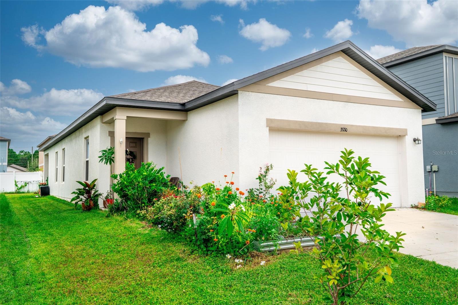 Tucked away in the peaceful and picturesque community of Hidden Creek in Zephyrhills, Daisy Meadow Loop welcomes you home with charm, comfort, and thoughtful design. This ranch-style gem offers an ideal blend of modern convenience and cozy living, perfect for anyone looking to settle into a vibrant yet tranquil neighborhood.

Built by Starlight Homes, this 3-bedroom, 2-bathroom residence showcases an open-concept layout designed for both everyday life and effortless entertaining. The heart of the home is a bright, inviting kitchen equipped with sleek stainless steel appliances, flowing seamlessly into a spacious living area that invites relaxation and togetherness. The private primary suite is your personal retreat, featuring a walk-in closet and an en-suite bath for added comfort.

Step outside to find a covered patio and a backyard with room to unwind, play, or garden—and here's a bonus: the current owners have lovingly maintained flower and garden beds that will remain for the next homeowners to enjoy. Whether you're a green thumb or simply love the sight of blooms in the morning light, this special touch adds to the home's natural warmth.

The Hidden Creek community is known for its friendly atmosphere and resort-style amenities. From the sparkling swimming pool and welcoming clubhouse to the dog park and playground, there’s something for everyone!

Commuters and weekend explorers alike will appreciate easy access to SR 54, Highway 301, and I-75, connecting you to nearby shopping, dining, and entertainment. Downtown Zephyrhills brings local charm with boutiques and eateries, while Tampa Premium Outlets and The Shops at Wiregrass are just a short drive away.

Whether you’re searching for your first home or your forever one, 35210 Daisy Meadow Loop is more than just a place to live—it’s a place to thrive. Schedule your private tour today and come experience the warmth, ease, and beauty of life in Hidden Creek.