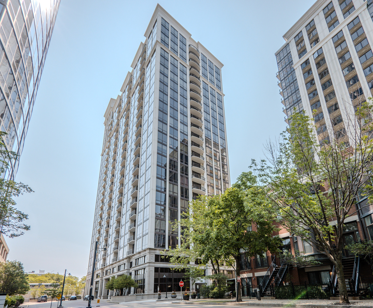 Rarely available high-floor corner unit with breathtaking panoramic views of Lake Michigan and the Chicago skyline.This stunning home offers one of the best unobstructed balcony views in the city -directly overlooking Grant Park, Buckingham Fountain, and Navy Pier.  Beautifully updated, this 2-bedroom, 2-bath condo features a desirable split floor plan, soaring ceilings, and floor-to-ceiling windows that flood the space with natural light. The unit was just freshly painted and has brand-new carpet. The open-concept layout is anchored by a chef's kitchen with granite countertops, 2021-2022 stainless steel appliances, a brand new microwave and a breakfast bar-perfect for everyday living and entertaining.  The primary suite boasts spectacular lake views, two organized closets, and a spa-like en-suite bath with dual vanities, a soaking tub, and a separate shower. The second bedroom offers city views and easy access to a full bath.   The building offers resort-style amenities, including an outdoor pool, a modern fitness center, a penthouse party room with views of the lake and Soldier Field, a club room, plus on-site conveniences such as a coffee shop, dry cleaners, and a convenience store.  Located in the heart of the South Loop, you're just steps from the lakefront, public transportation, museums, parks, shopping, and dining.Monthly assessments cover heat, A/C, water, gas, cable, and bike room access.Storage cage included.Heated garage parking available for an additional cost.
