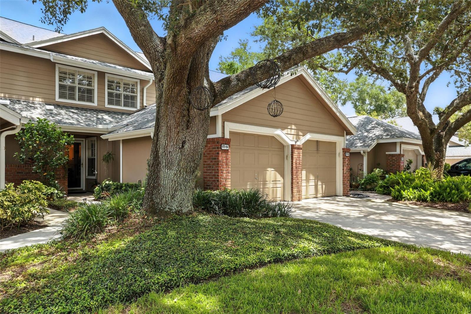 Welcome Home! Discover Oak Harbour, a tranquil gated community nestled along the scenic shores of Lake Orienta on Maitland Ave. This peaceful enclave offers a resort-style lifestyle with exceptional amenities; all set within a beautifully maintained natural landscape.
 
Step into this renovated 2-bedroom, 3-bath townhouse, where thoughtful upgrades and timeless design create a warm and inviting home. You'll love the bright, open floor plan featuring rich cherry hardwood floors, elegant crown molding, and abundant natural light throughout. The stunning kitchen is a chef’s dream, complete with granite countertops, custom light fixtures, a charming breakfast nook, and a built-in desk for added functionality. Whether you're entertaining guests or enjoying a quiet morning, this space is both stylish and practical.
The main floor also includes a modern half bath, a formal dining area, and a cozy sunken living room with a full wall of windows adorned with plantation shutters, perfect for taking in the view or unwinding after a long day. Step outside to your private screened-in patio and relax in the lush tropical garden, your own serene oasis for morning coffee or evening cocktails. Upstairs, you’ll find two spacious master suites, each offering fully updated en-suite bathrooms and generous closet space, ideal for comfort and privacy.
 
Recent upgrades include:
• New roof and skylight (2024)
• New gutters with leaf guards (2024)
• New water heater (2025)
• Full re-pipe completed (2025) with transferable 25-year warranty 
 
The Oak Harbour community features a wide array of amenities, including a clubhouse with a fitness center, meeting rooms, two swimming pools, courts for tennis, pickleball, basketball, and shuffleboard, as well as a grilling patio and picnic area. Take advantage of the private boat ramp and fishing pier on Lake Orienta, perfect for kayaking, boating, and enjoying breathtaking sunset views. Stroll or jog along tree-lined paths, or simply relax and admire the beauty of the meticulously landscaped grounds.

Conveniently located on the edge of Maitland, you're just minutes from Winter Park, downtown Orlando, the Sun Rail station, Altamonte Mall, top-rated hospitals, and a wide variety of upscale dining, shopping, and entertainment options.
This stylish, move-in-ready townhouse offers a rare combination of elegance, location, and lifestyle. Schedule your private showing today!