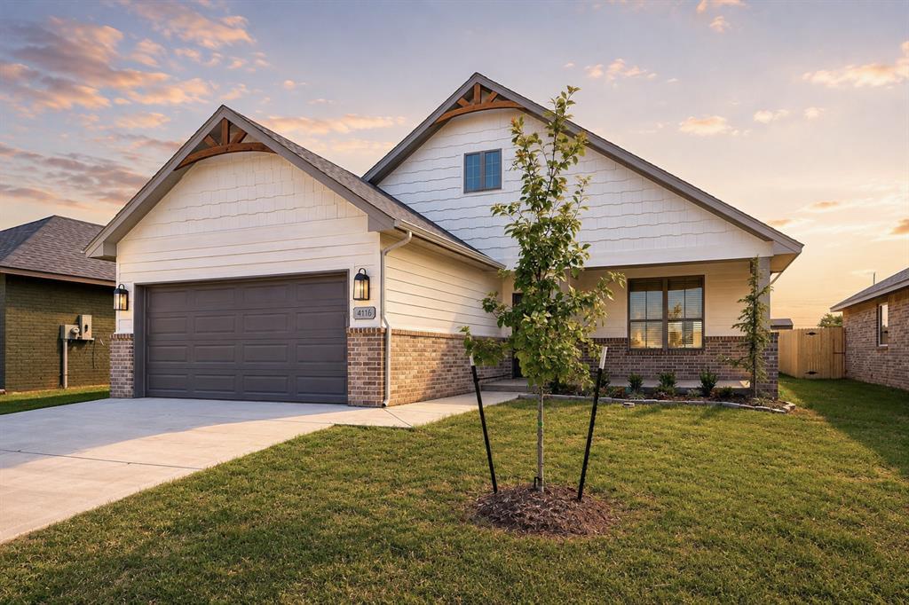 Welcome to your dream home! For a LIMITED TIME, take advantage of Builder's $5000 incentive toward options or closing costs! This stunning new construction home, built by an award-winning, Professionally Certified Builder, offers the perfect blend of luxury, comfort, and functionality. The thoughtfully designed Ellwood floor plan showcases stylish upgraded wood-look tile flooring throughout all main living areas, creating a warm and inviting atmosphere. Step into the chef-inspired kitchen, complete with custom-built maple cabinetry, upgraded stainless steel appliances, abundant countertop space, and a spacious walk-in pantry, ideal for both daily living and entertaining. Tucked away for added privacy, the serene primary suite serves as a relaxing retreat with its generously sized bedroom, expansive walk-in closet, and spa-like en-suite featuring a garden tub and an elegant, fully tiled glass shower. Two additional bedrooms offer ample closet space and share a beautifully appointed hall bath with a fully tiled tub surround. A large utility room, window blinds, and an energy-efficient tankless water heater provide modern convenience throughout. This home also comes complete with an underground sprinkler system! Enjoy outdoor living year-round with a covered front porch and covered back patio, plus the added benefit of a spacious 2-car garage. This home comes complete with a tankless water heater, blinds, and a sprinkler system! Schedule your tour today and experience the perfect balance of style, space, and smart design!