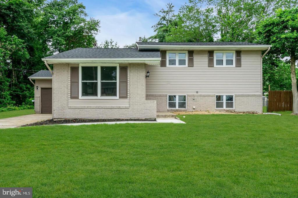 Step into this beautifully renovated split-level single-family home, where modern upgrades meet timeless charm. Featuring a brand new roof and HVAC system, this home offers worry-free living from day one.Enjoy cooking in your stunning new kitchen complete with custom white shaker cabinets, sleek quartz countertops, and a stylish custom tile backsplash. The home is filled with natural light, thanks to brand new windows throughout, and showcases fresh paint, new laminate flooring, and plush new carpeting.The main level welcomes you with a bright formal living room and a separate dining area—perfect for family meals or entertaining guests. A spacious family room provides ample space for gatherings, movie nights, or parties.The updated bathroom features designer tile work and a clean, modern look. Step outside to a covered patio overlooking a huge backyard—ideal for outdoor entertaining or relaxing weekends. A one-car garage adds convenience and extra storage.Located just minutes from Route 130, Route 295, and the NJ Turnpike (Exits 5 & 6), commuting to Pennsylvania or anywhere in the region is a breeze. You’re also close to great shopping, dining, and golf courses—everything you need is right at your fingertips.Don’t miss the opportunity to own this turnkey home with exceptional upgrades in a prime location!