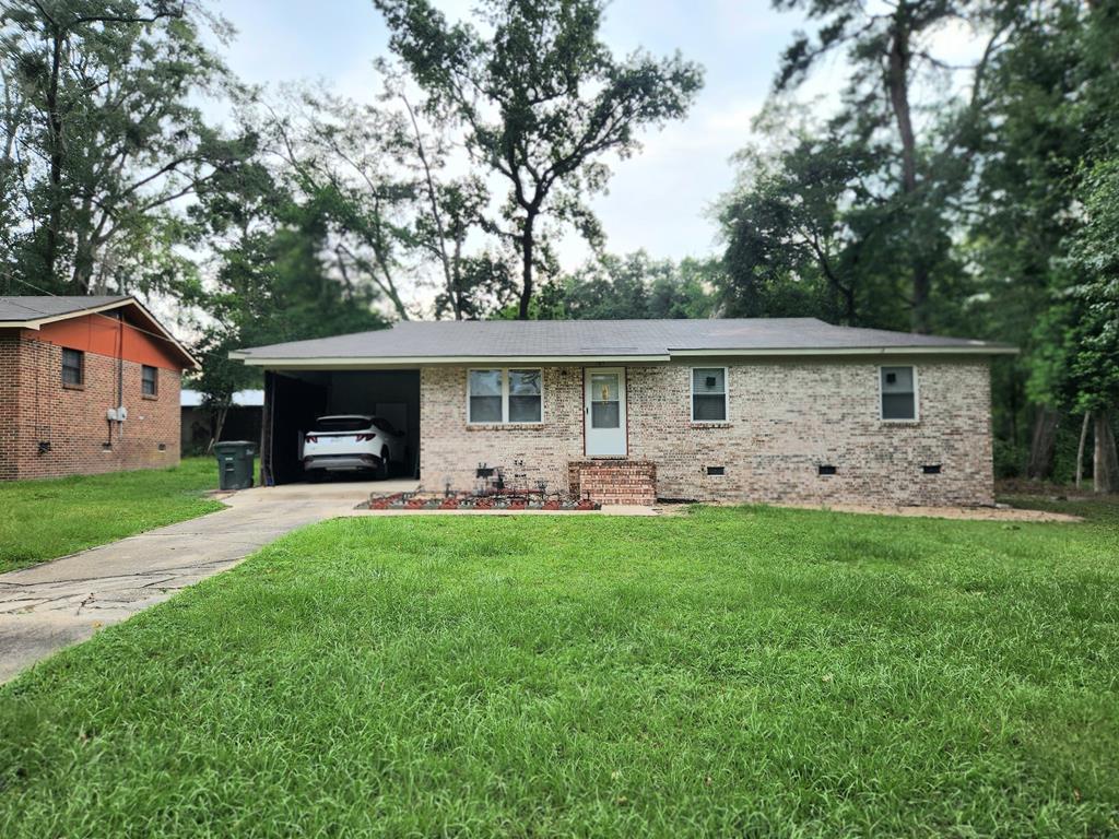 Check out this 3-bedroom home nestled in the Fruit City neighborhood. This delightful brick ranch boasts an inviting charm that combines classic design with modern features. Just a short commute to Thomas University campuses and Archbold hospital, this property is perfect for families, students, or anyone seeking a starter home close to all the conveniences of in-town amenities.