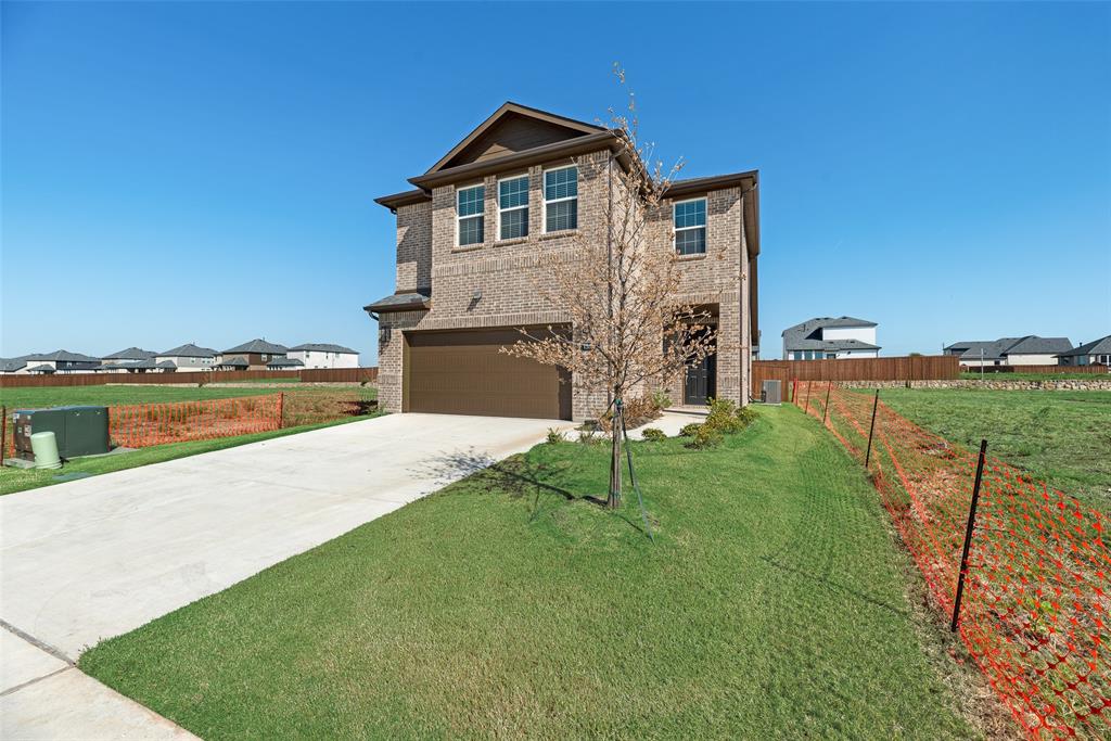 Step inside to an inviting open-concept layout where the kitchen seamlessly connects to the living room—ideal for entertaining or family gatherings. The kitchen features stainless steel appliances, granite countertops, and ample cabinetry, creating a functional yet elegant space. The living room boasts a cozy fireplace and a ceiling fan, adding both warmth and comfort. On the main floor, you’ll find a bedroom and a full bathroom, perfect for guests or multi-generational living. Heading upstairs, discover the spacious master suite, complete with a private bath, along with two additional bedrooms and another full bathroom. Outside, enjoy a nicely sized yard that offers plenty of room for outdoor activities, gardening, or relaxation. This beautiful home combines modern craftsmanship with thoughtful design—ready for you to move in and make it your own.