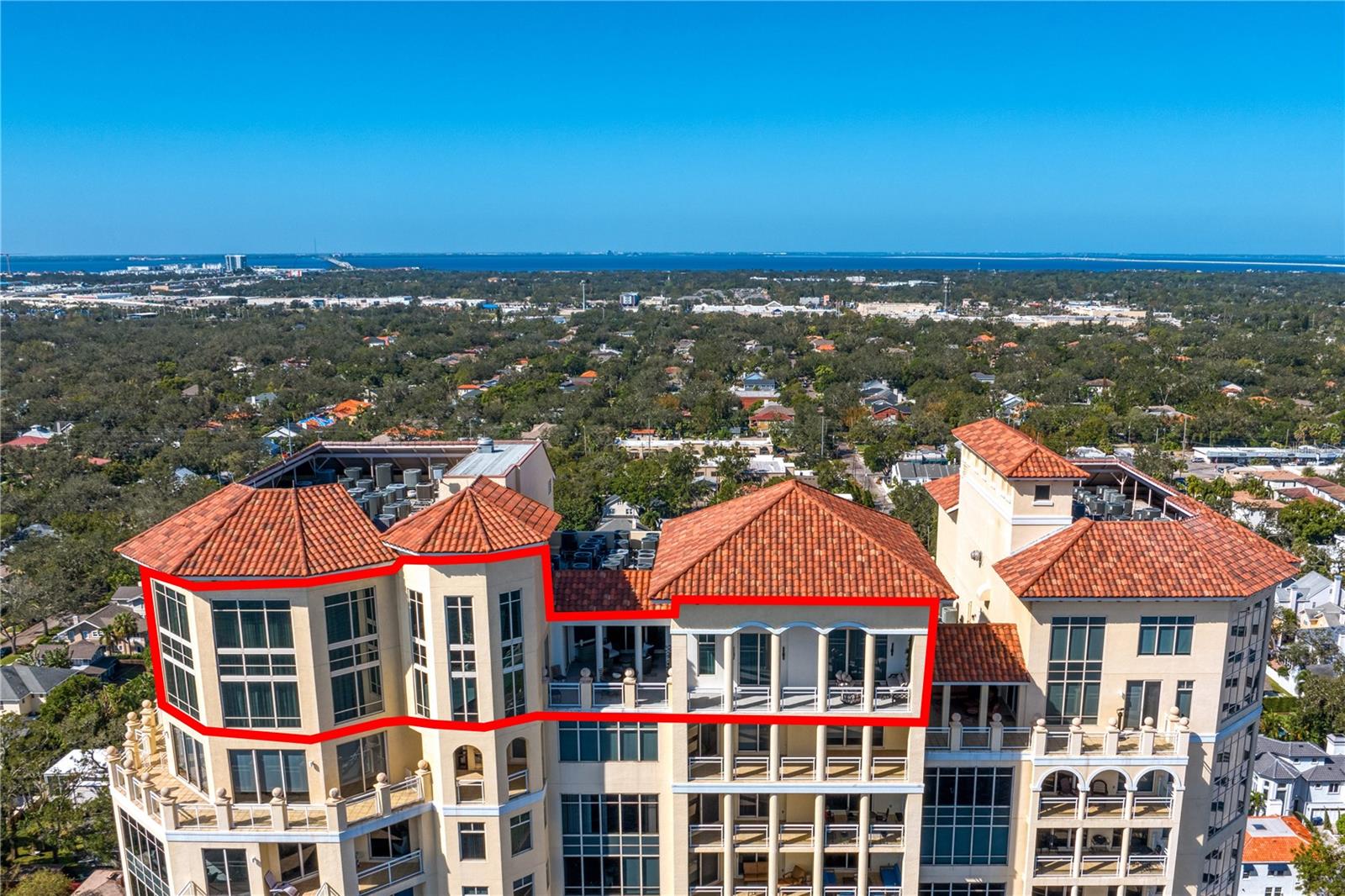 Experience unparalleled luxury in this 2-story penthouse condominium impeccably renovated down to the concrete in 2022 boasting 270° views from the showcase floor-to-ceiling windows. Luxury living with breathtaking Tampa Bay water and city skyline views of Tampa and St. Petersburg. Located on the 21st and 22nd floors, this stunning residence lives like a single-family home in the sky featuring 3 ensuite bedrooms (primary on the first floor), 3.5 bathrooms, 2 home offices (one easily converted into a bedroom), a theater room, and open loft space spanning a total of 6,143 sq. ft. Unique to Tampa condominium living, this home also features over 1,200 sq. ft. of extraordinary exterior balcony space to enjoy the gas fireplace, the outdoor television, and the custom greenery wall or all three while relaxing or entertaining! Special penthouse amenities include a 2022 private in-unit Savaria elevator, 3 parking spaces (1 with EV hookup), and a large private storage unit (14x16). Other interior features include fully customized Lutron lighting and window treatments, cove lighting throughout, 4 AC units, Sub Zero wine chiller (102 bottles), 2 electric hot water heaters, LG washer and dryer, and built-in drying rack and ironing board. The kitchen is a showstopper with 2 Cove dishwashers, instant hot water in sink, Ulline icemaker, pop up counter electrical outlets, Wolf Gas French Top 6-burner cooktop, Miele electric oven, Miele coffee machine and SubZero 36 inch each refrigerator and freezer, catering prep station and walk-in hidden pantry. The primary bedroom suite is also brimming with indulgences like bedside lighting pads, Toto toilet, water closet iPad, appliance drawers equipped with USB plugs, Custom walk-in closet with deep drawers and pull-out shelves in addition to a laundry pass through. The Bellamy is known for its timeless style and commitment to excellence for the residents. The property manager is on site Monday-Friday as well as concierge service 24/7. The building offers a newly renovated 2-story lobby with a mezzanine, resort-style pool and spa, wine cellar, and a fitness center including locker rooms with a steam room and sauna. Experience the ultimate in luxury comfort living today! Architect-Cooper, Johnson, Smith, Peterson – Tampa, FL, Contractor-Onicx -- Tampa, FL, Interior Designer-Harpole Architects -- Washington DC